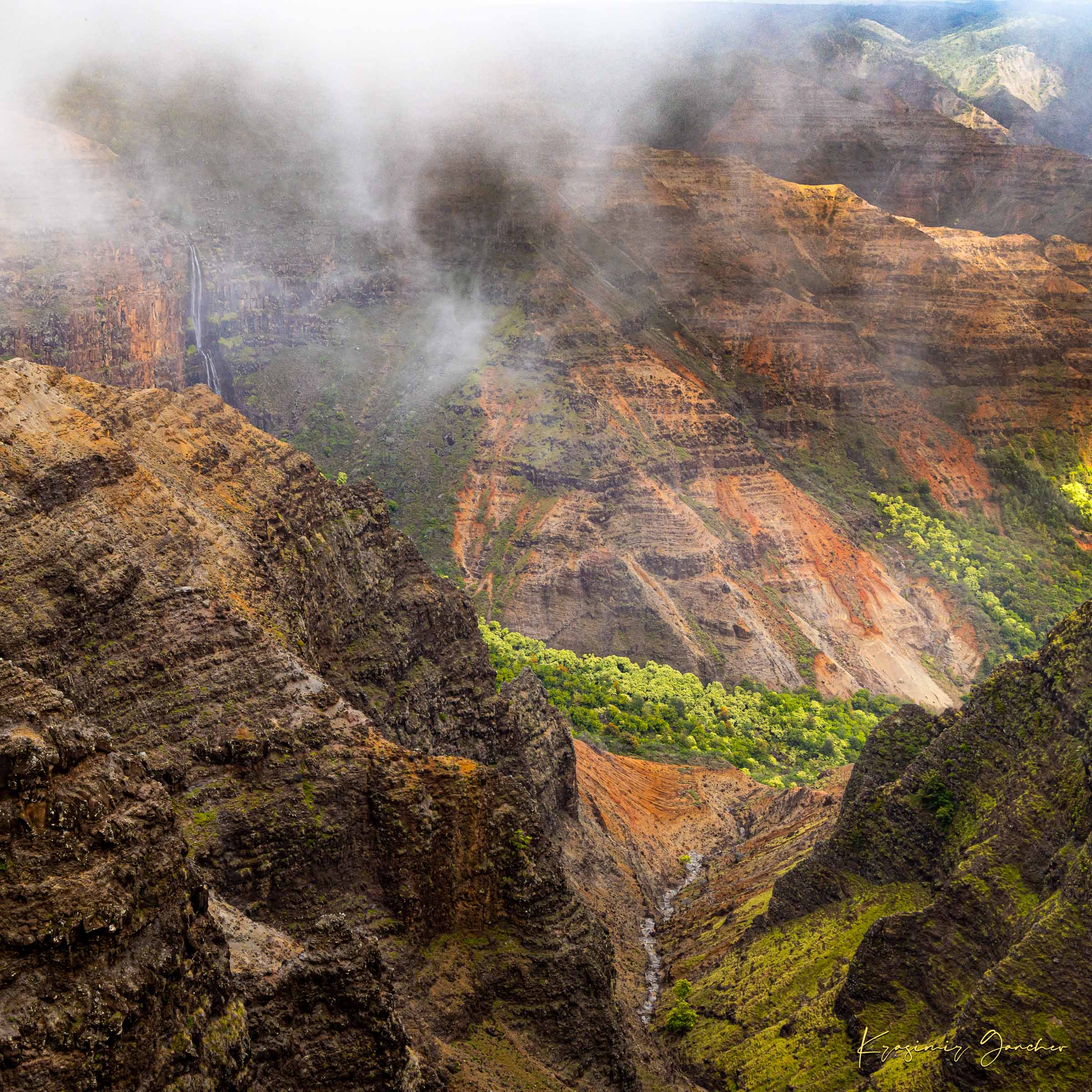 Waterfall descending into Waimea Canyon on Kauai, mist rising through dense foliage in foggy conditions. #Finish_Acrylic Recess