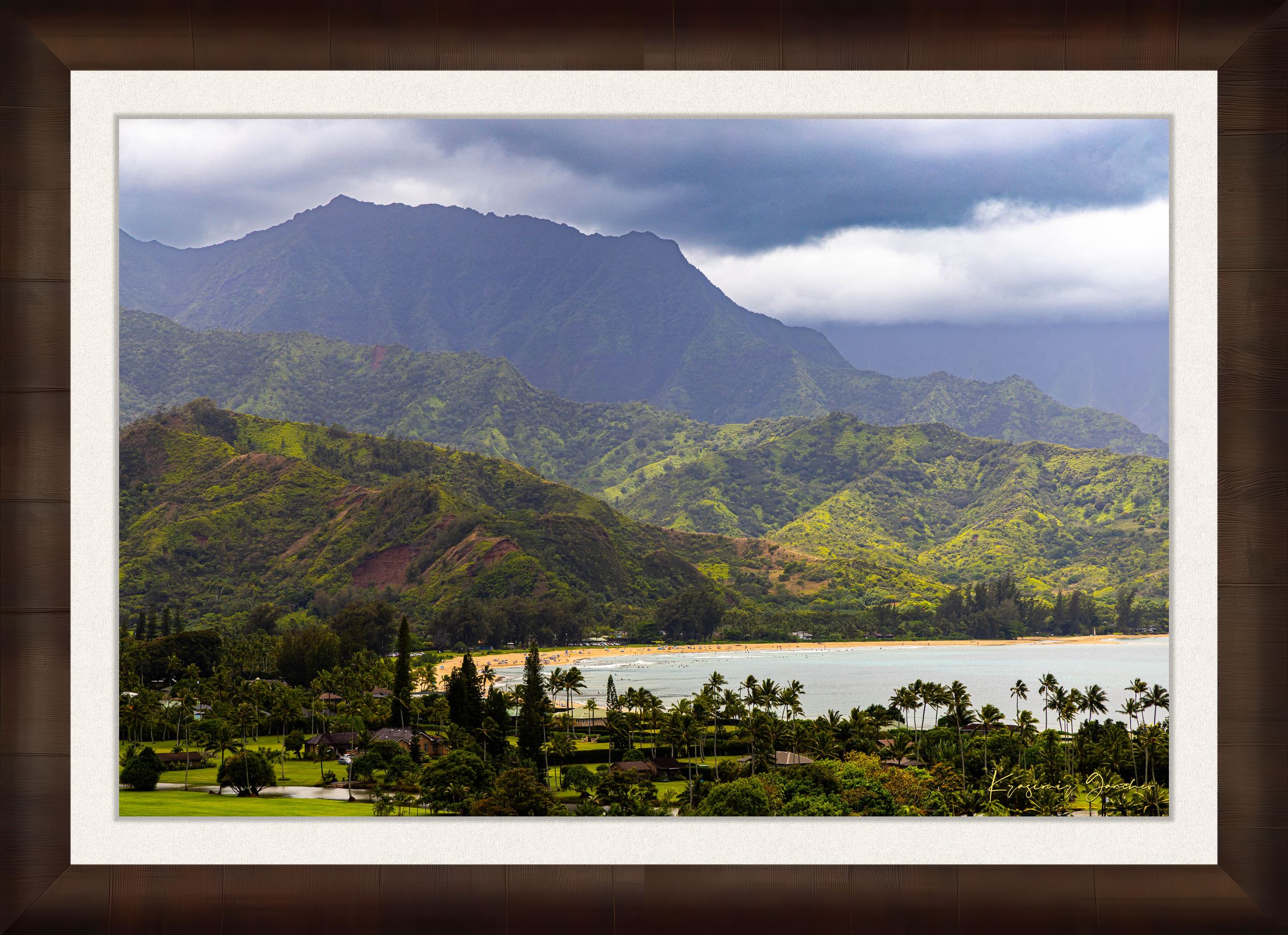 Ocean view of Hanalei Bay on Kauai's coast with lush hills and distant cloud-covered peaks. #Finish_Roma Cigar Leaf Frame & Bright Liner