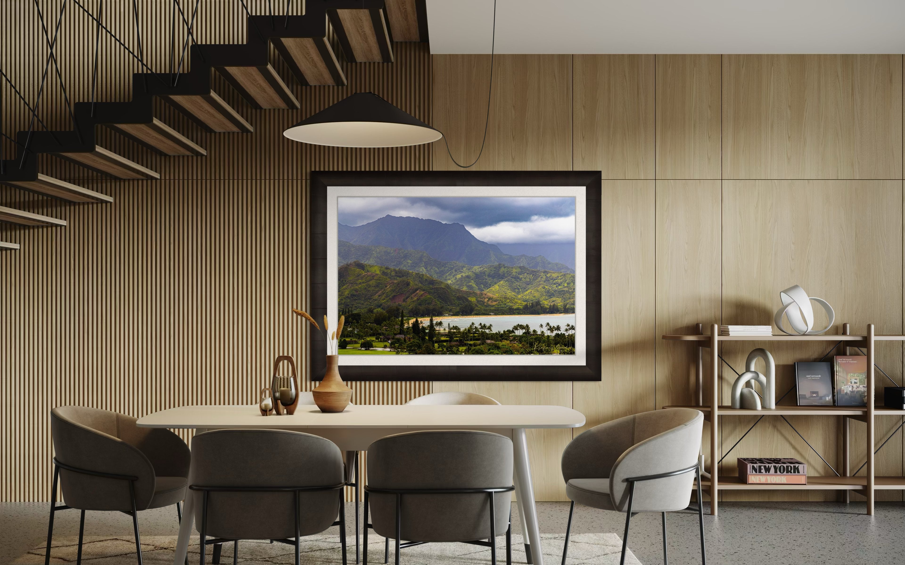 Ocean view of Hanalei Bay on Kauai's coast with lush hills and distant cloud-covered peaks. #Finish_Roma Dark Ash Frame & Bright Liner