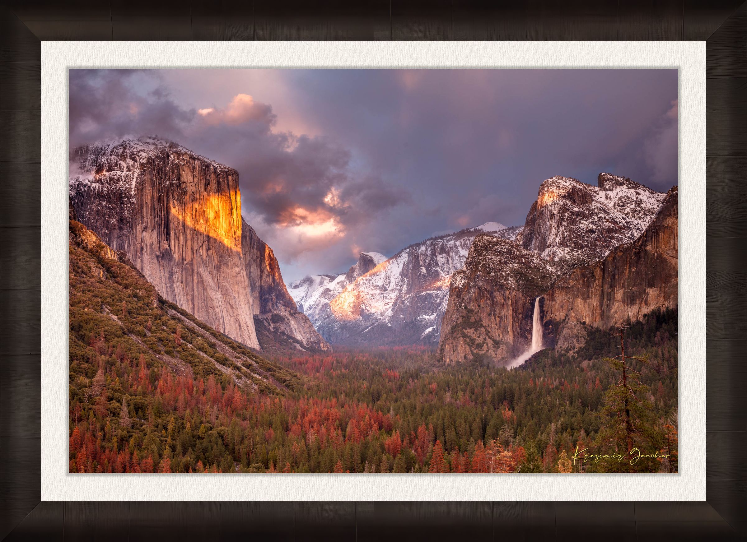 Granite monolith El Capitan rises above Yosemite Valley at golden hour, with snowy peaks and falling waterfall. #Finish_Roma Dark Ash Frame & Bright Liner