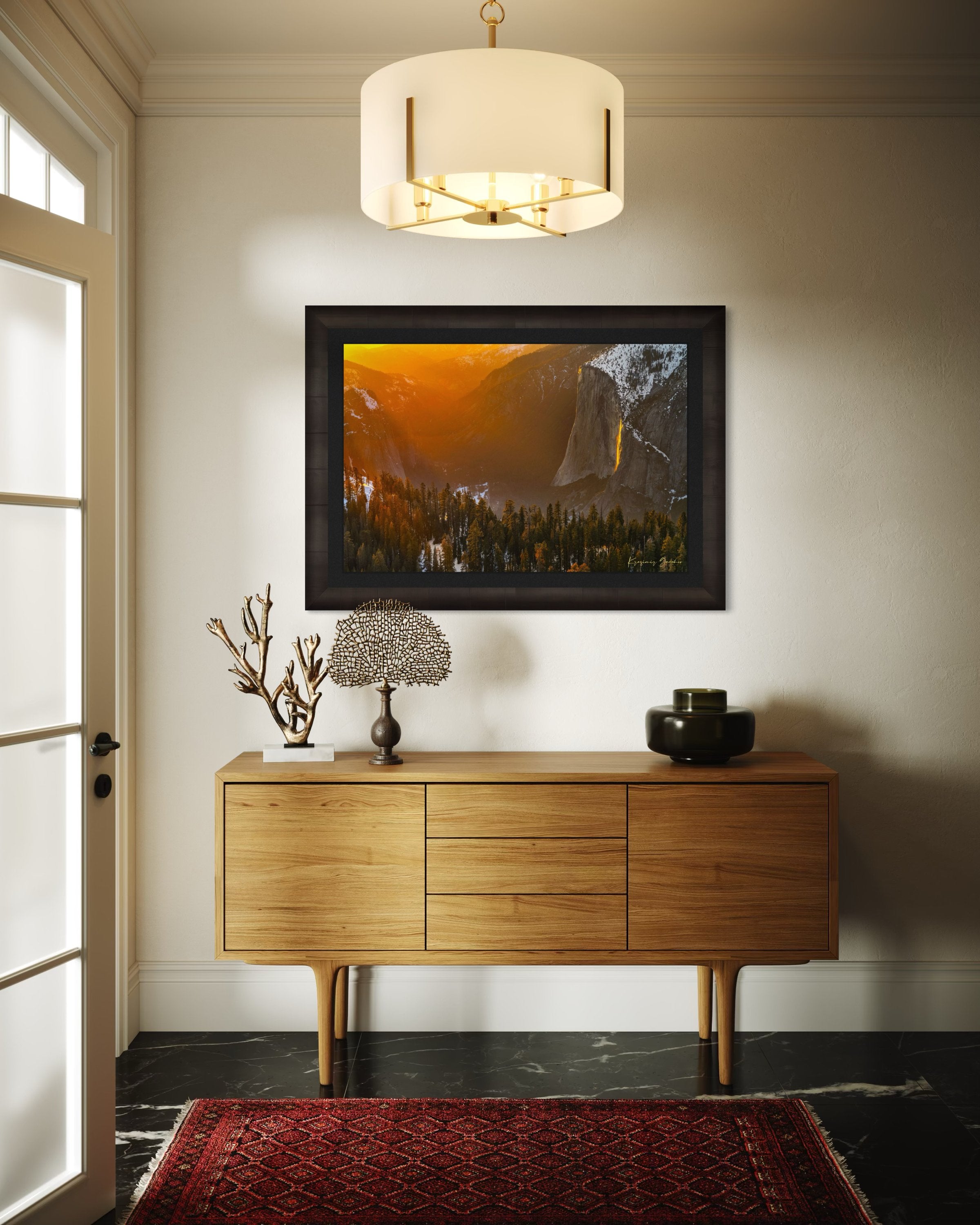El Capitan illuminated by firefall light as a waterfall glows orange in Yosemite Valley. #Finish_Roma Dark Ash Frame & Dark Liner