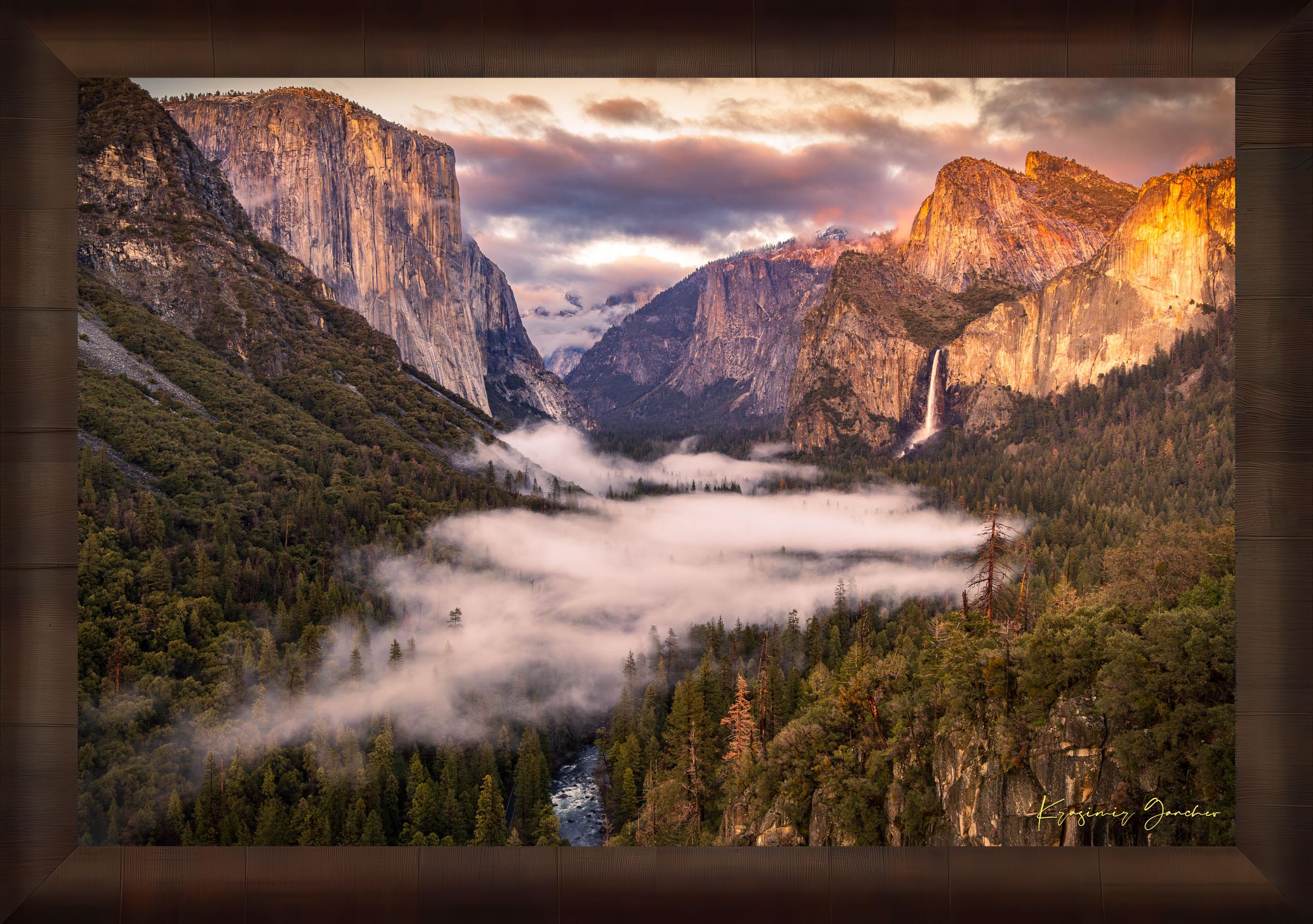 El Capitan silhouetted against sunset in Yosemite Valley, mist rising from river and waterfall beneath cloudy sky. #Finish_Roma Cigar Leaf Frame