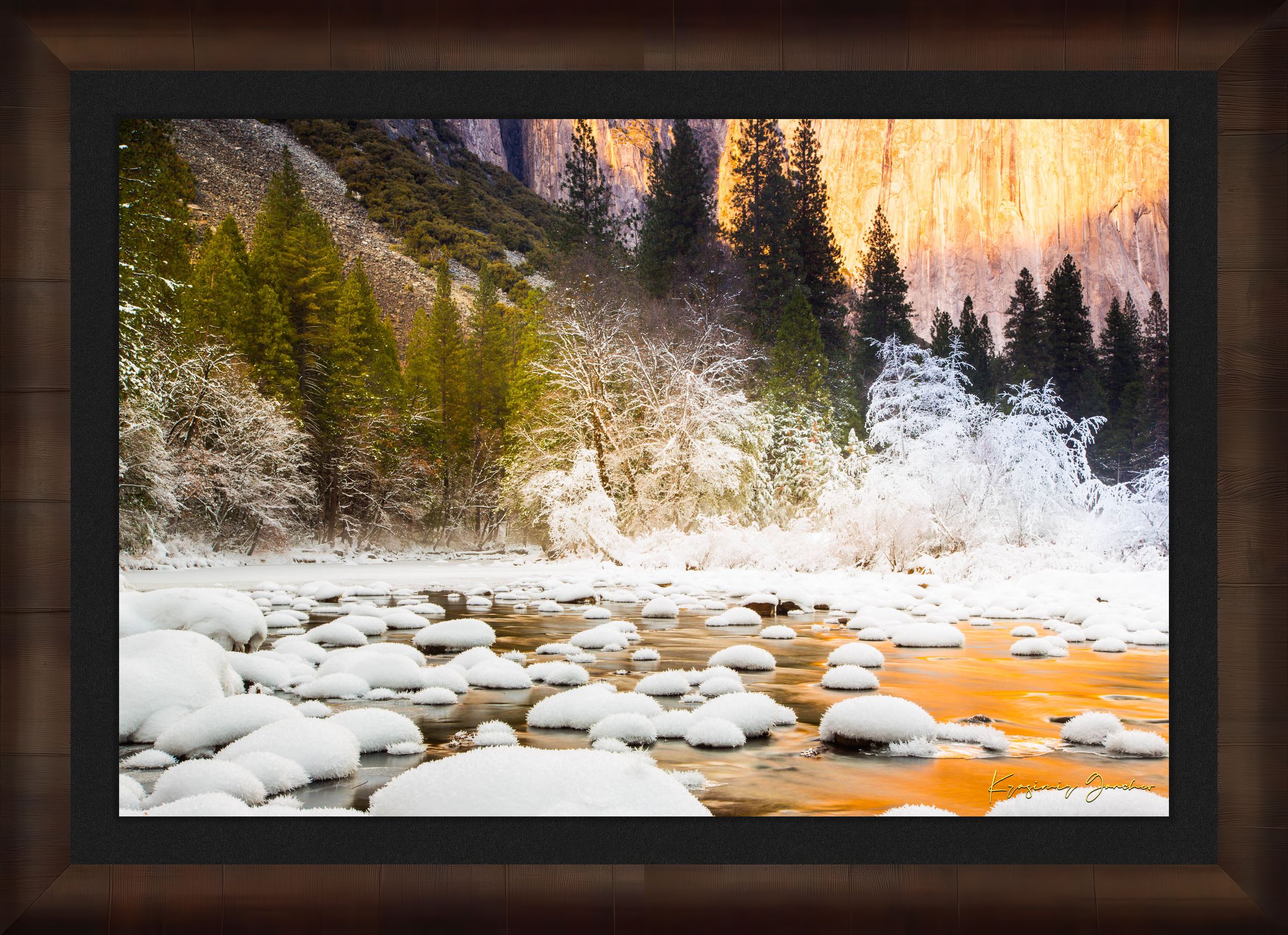 Merced River flowing through Yosemite National Park during sunset with golden light reflecting on snowy granite rock faces. #Finish_Roma Cigar Leaf Frame & Dark Liner