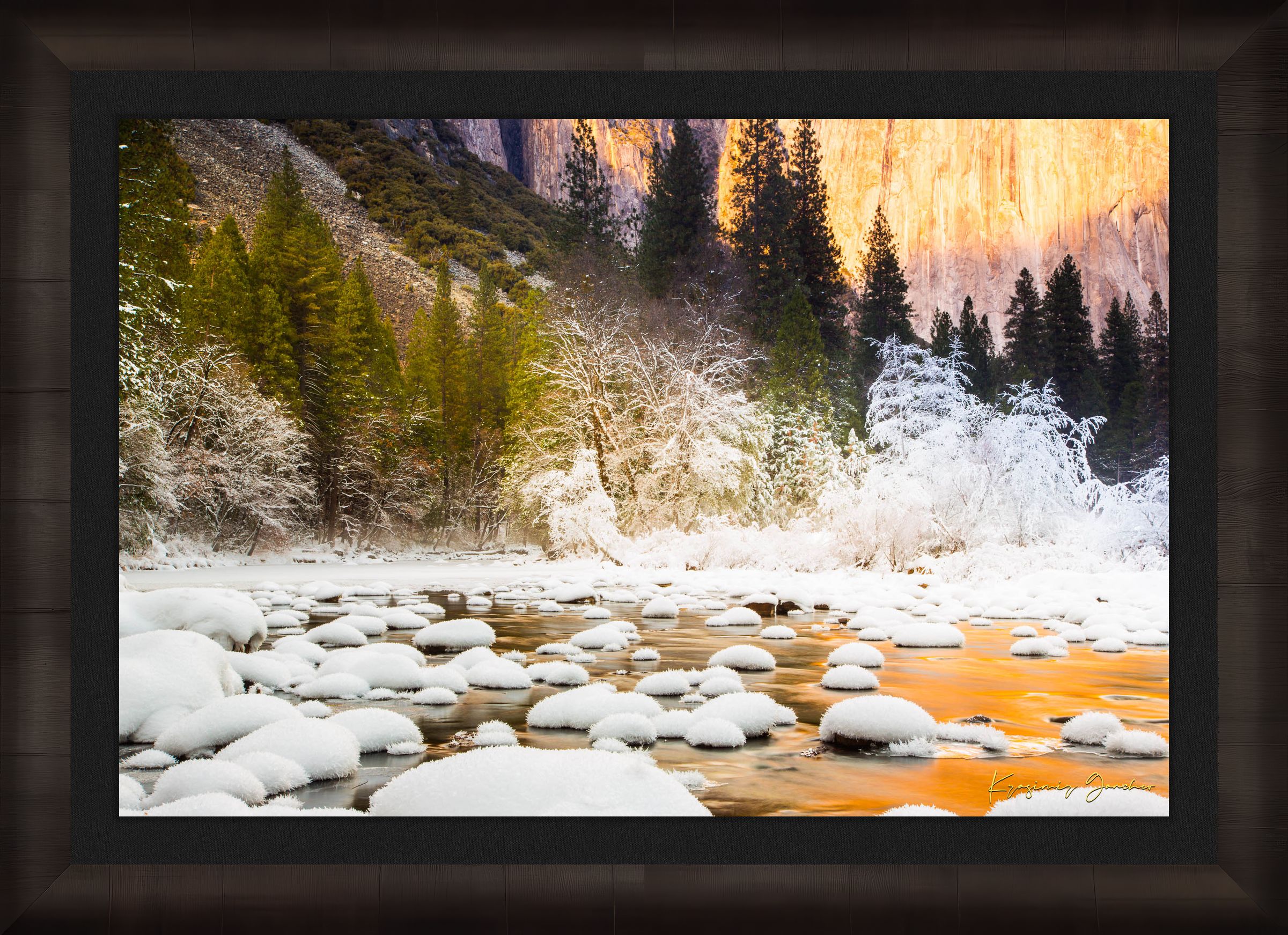 Merced River flowing through Yosemite National Park during sunset with golden light reflecting on snowy granite rock faces. #Finish_Roma Dark Ash Frame & Dark Liner