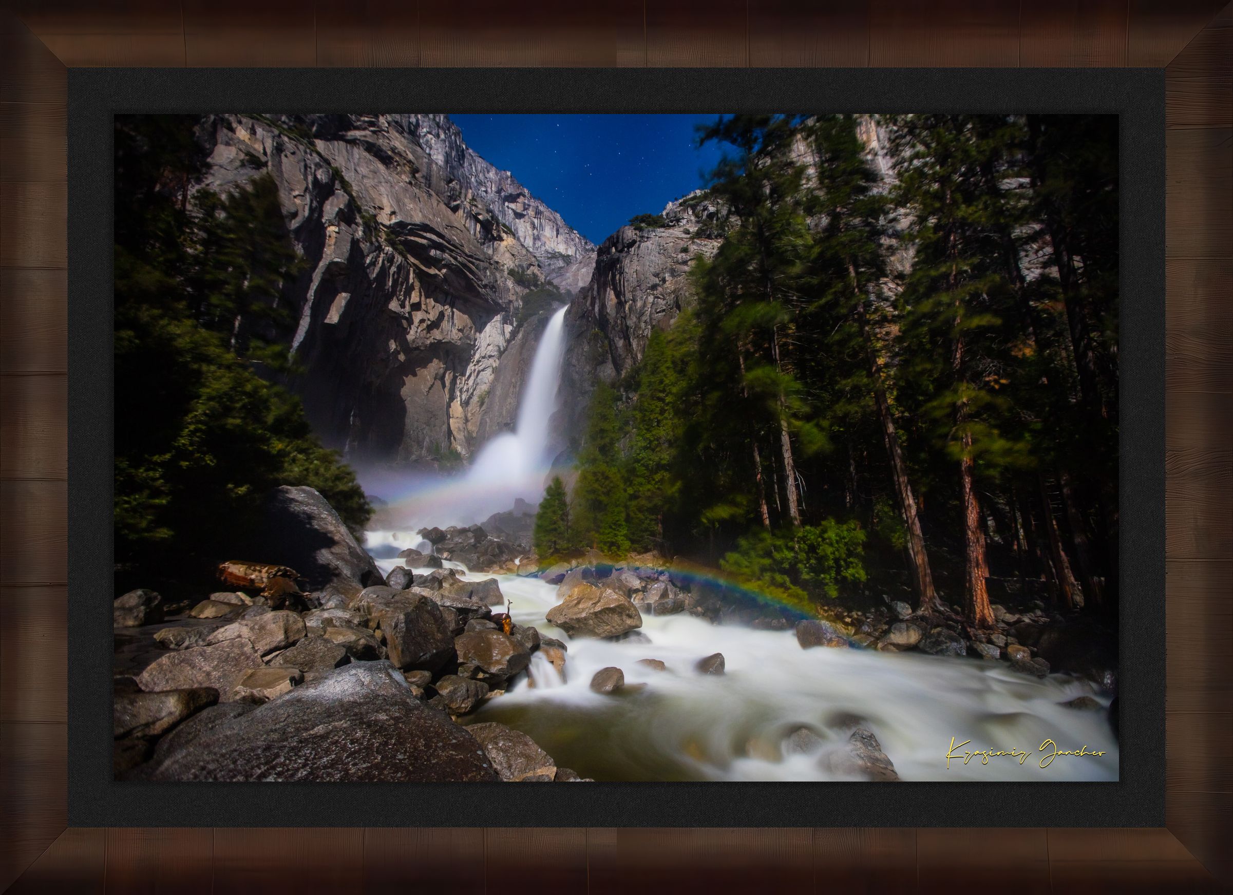 Yosemite Falls illuminated by starlight and an arc of moonbow, long exposure capturing flowing water against a clouded sky. #Finish_Roma Cigar Leaf Frame & Dark Liner