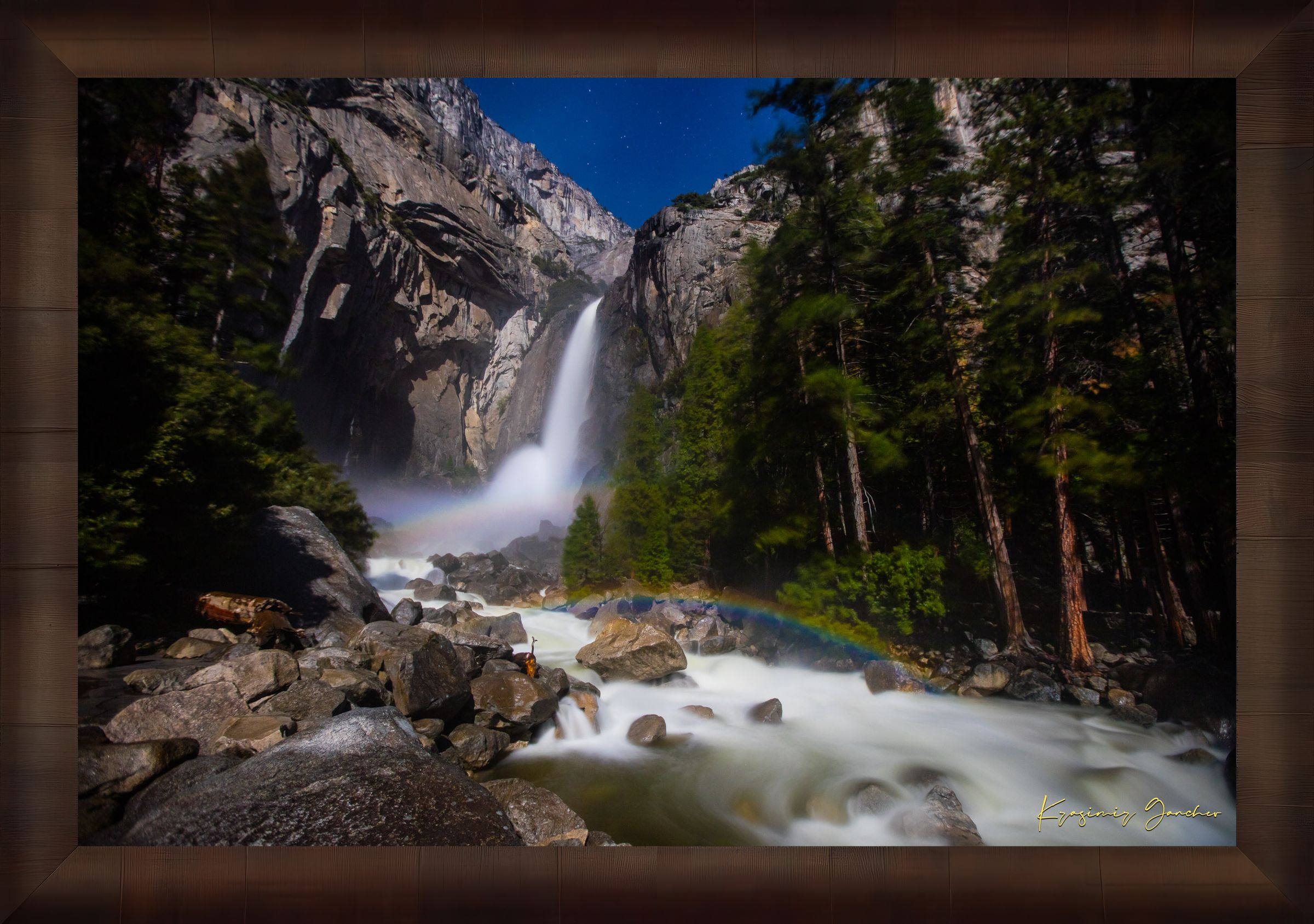 Yosemite Falls illuminated by starlight and an arc of moonbow, long exposure capturing flowing water against a clouded sky. #Finish_Roma Cigar Leaf Frame