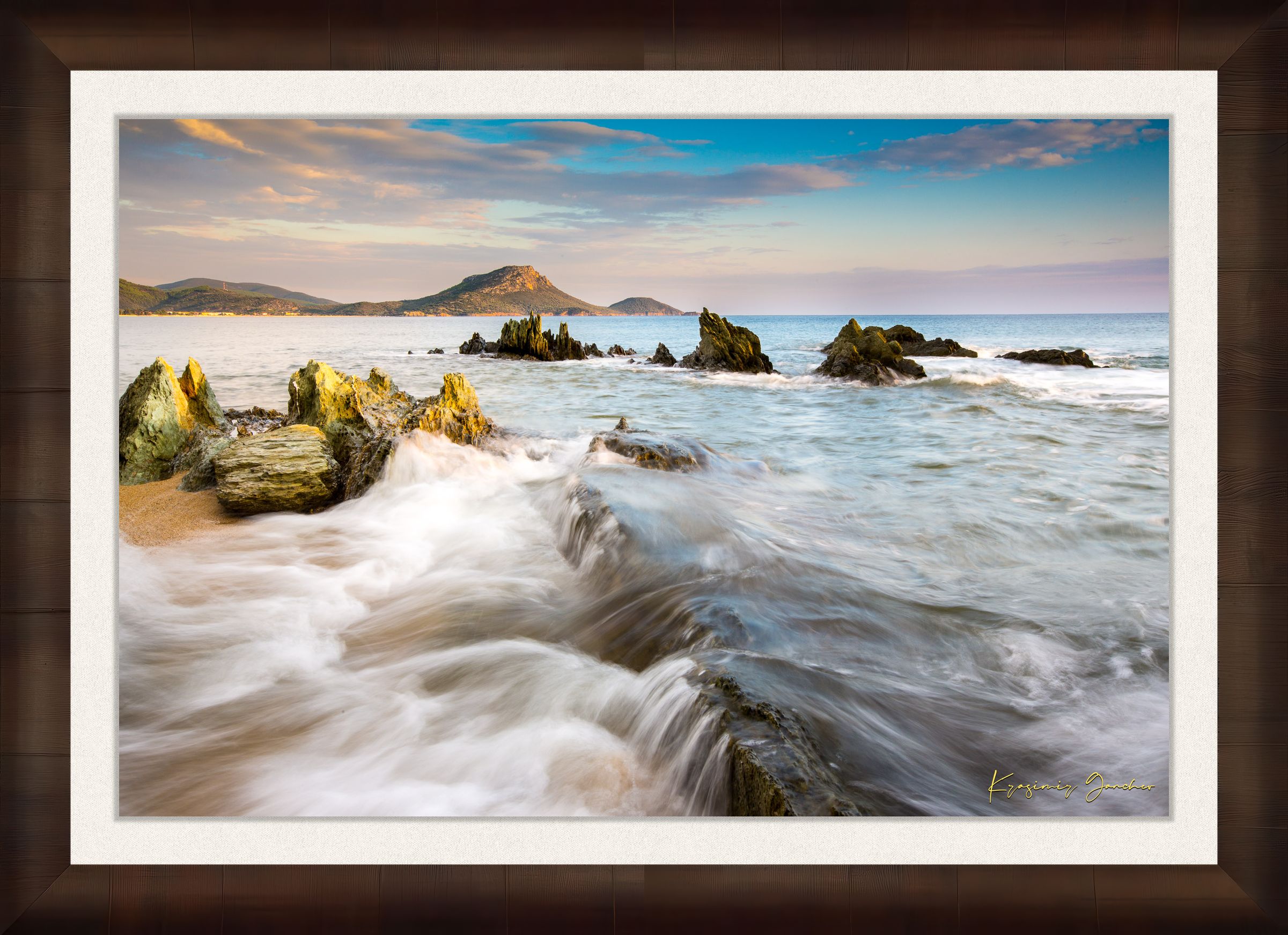 Sunset view of Sithonia's coastline featuring sea, rocky beach, scattered boulders, and gentle waves. #Finish_Roma Cigar Leaf Frame & Bright Liner