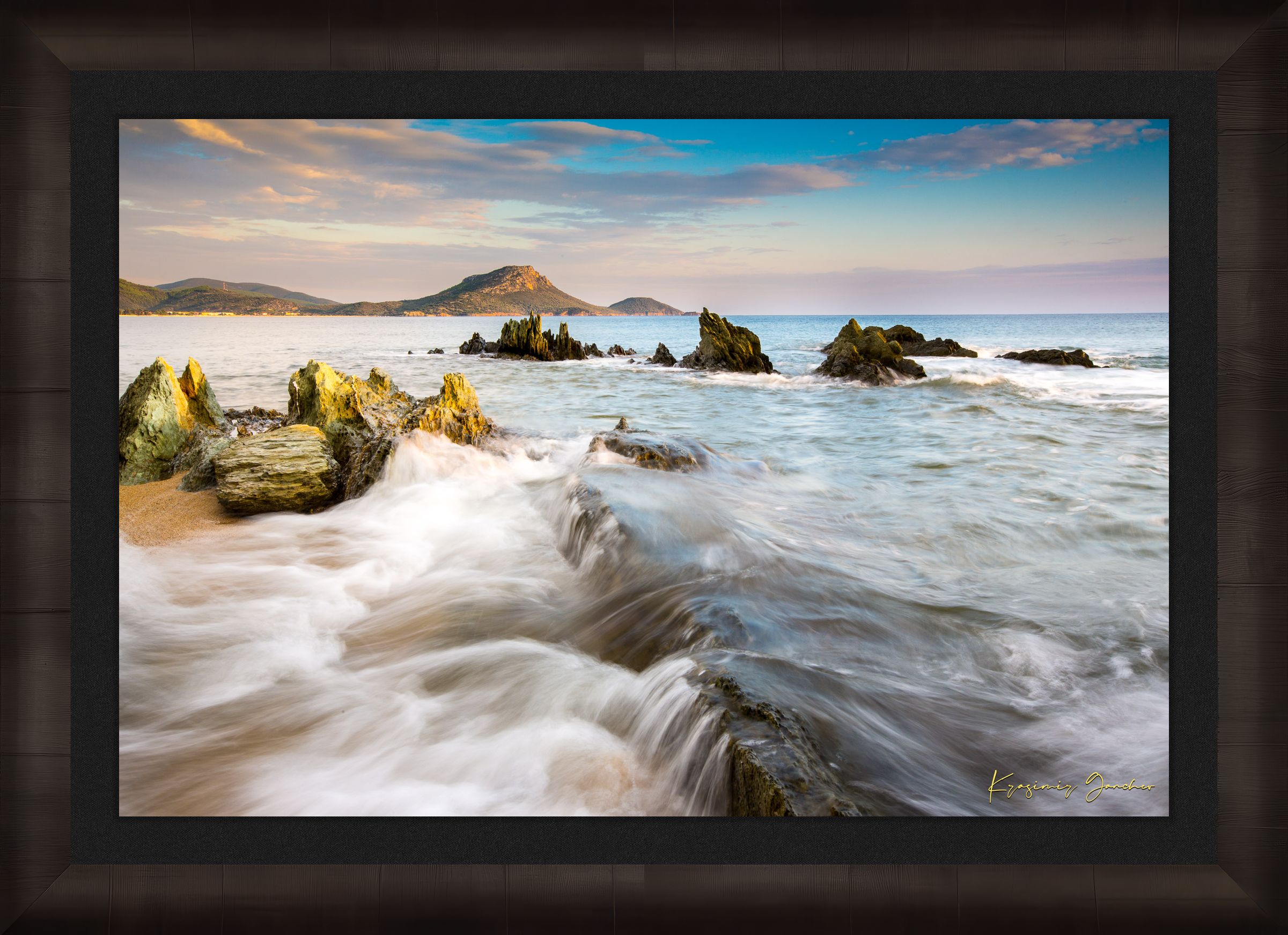 Sunset view of Sithonia's coastline featuring sea, rocky beach, scattered boulders, and gentle waves. #Finish_Roma Dark Ash Frame & Dark Liner