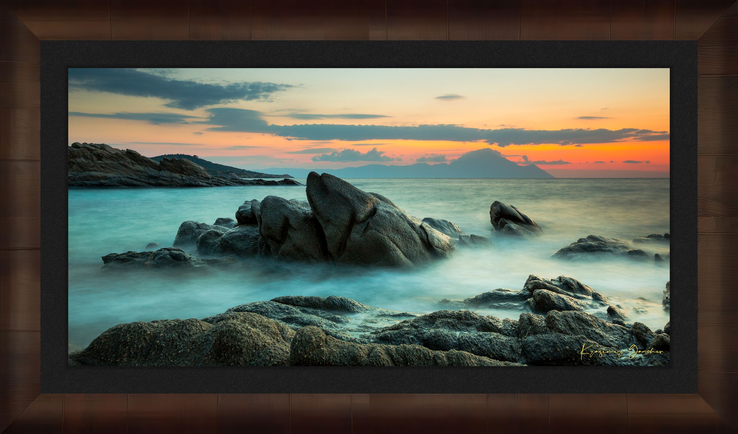 Sunrise long exposure at Sarti featuring coastal rock formations, sea stacks, cloud-covered sky, and soft waves. #Finish_Roma Cigar Leaf Frame & Dark Liner