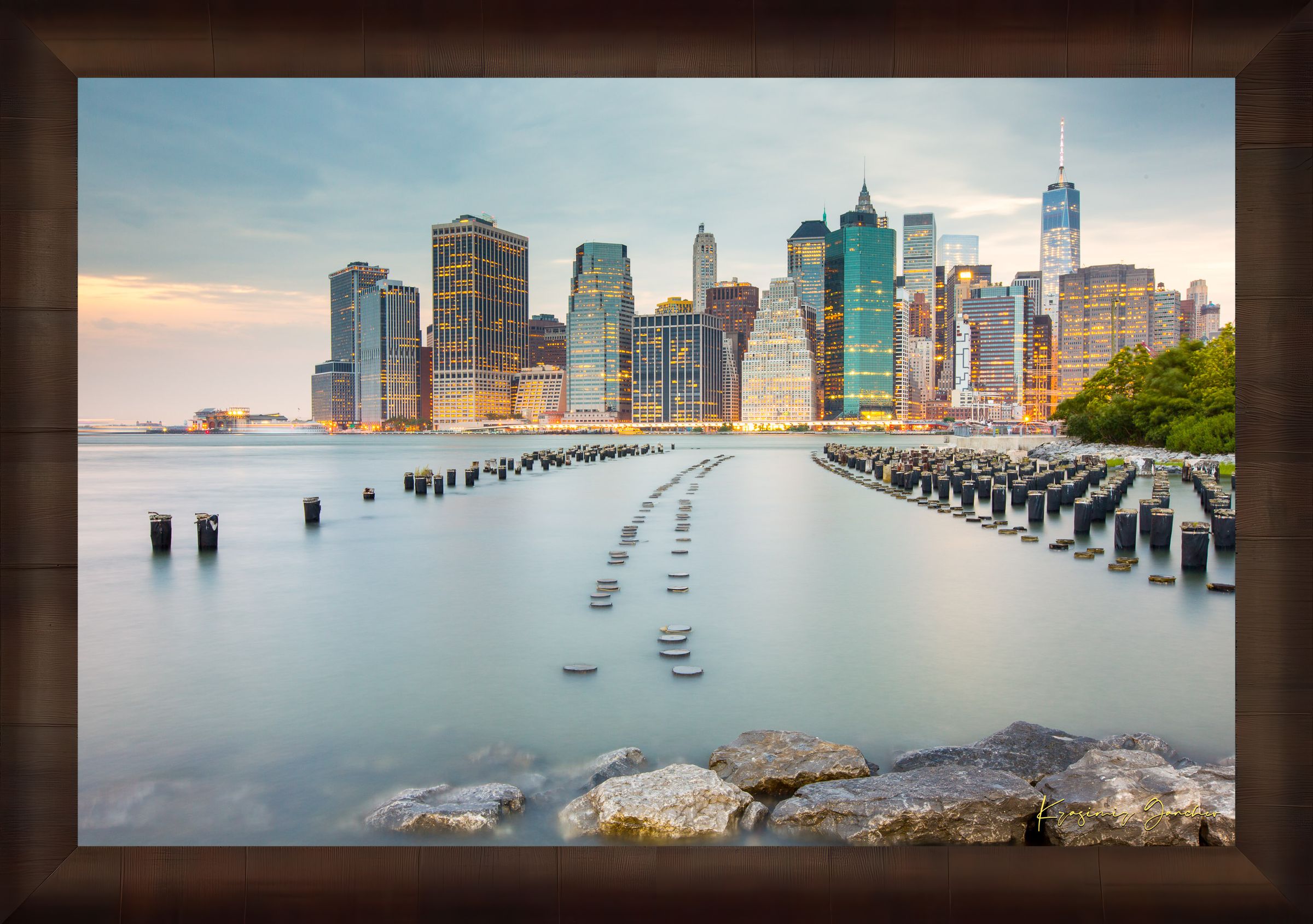 Urban waterfront scene along an estuary in Manhattan under a twilight sky with clouds and reflected city lights. #Finish_Roma Cigar Leaf Frame