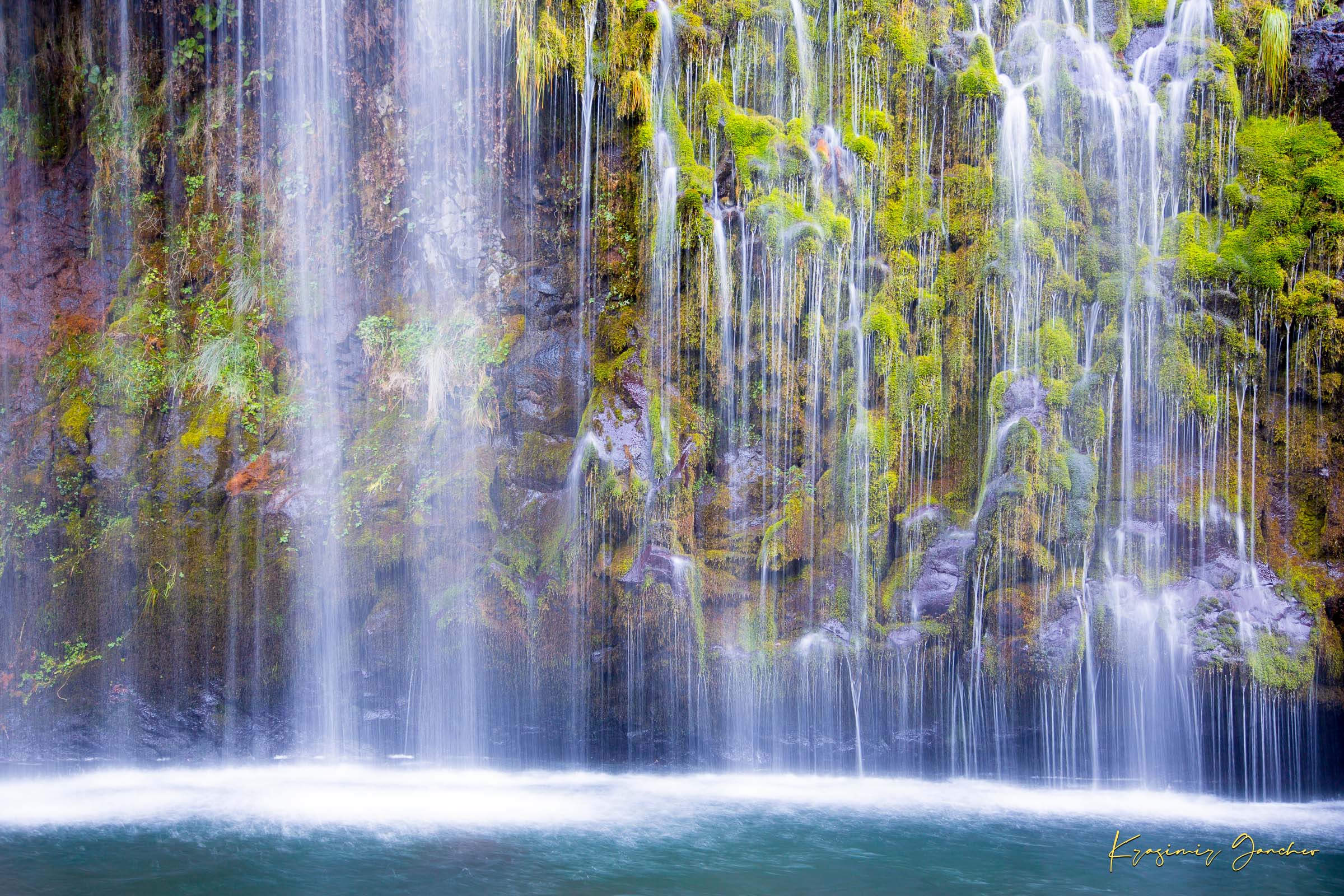 Waterfall cascading through a forested gorge at Mossbrae Falls during daylight with visible mist and dynamic movement. #Finish_Acrylic Recess