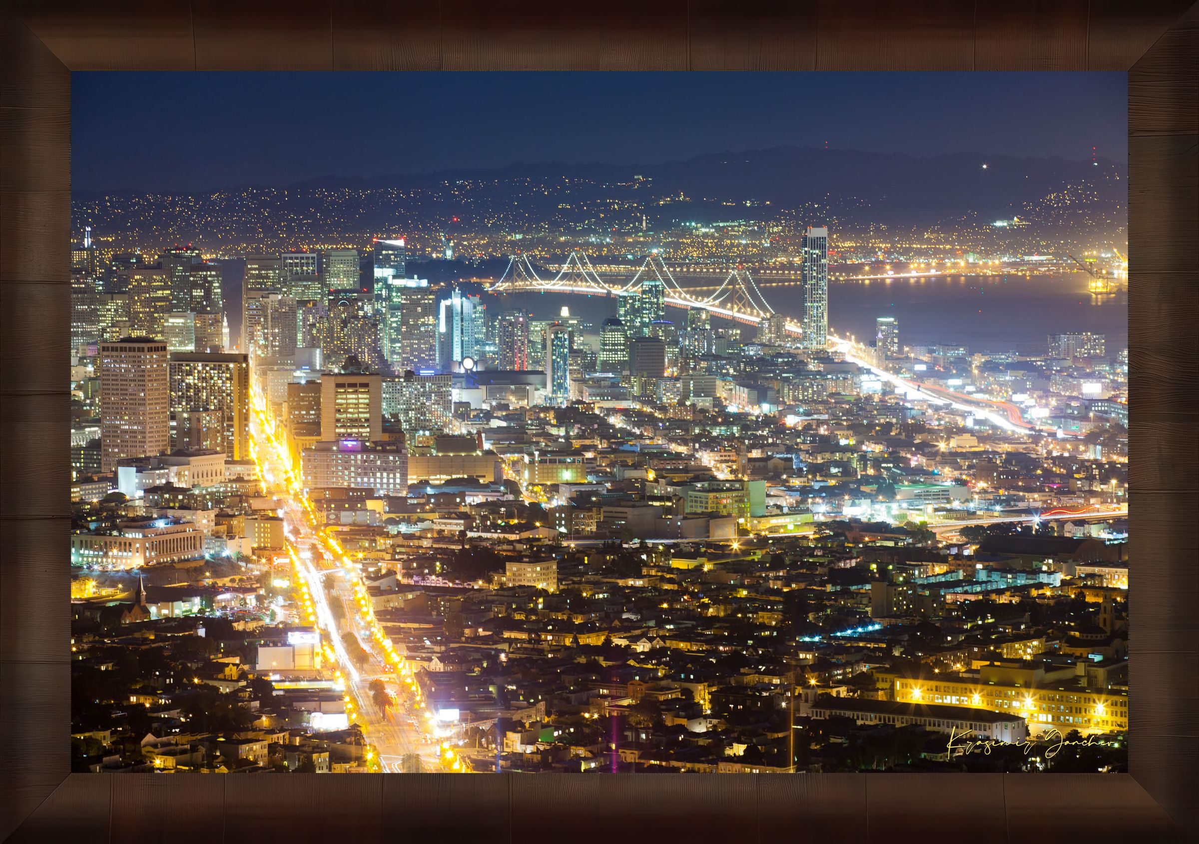 Nighttime panoramic view from Twin Peaks, San Francisco, with illuminated city lights reflected on the bay through a layer of mist. #Finish_Roma Cigar Leaf Frame