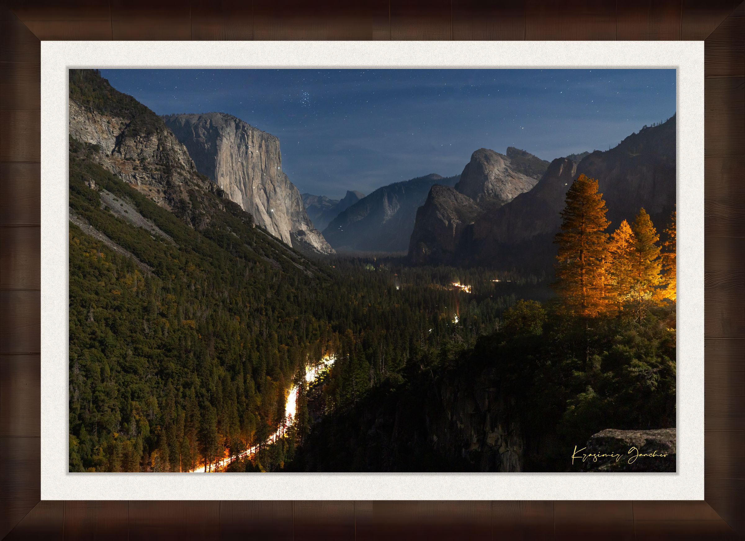 El Capitan at night in Yosemite Valley, moonlight revealing climbing gear and waterfall with clouds above, serene wilderness scene. #Finish_Roma Cigar Leaf Frame & Bright Liner
