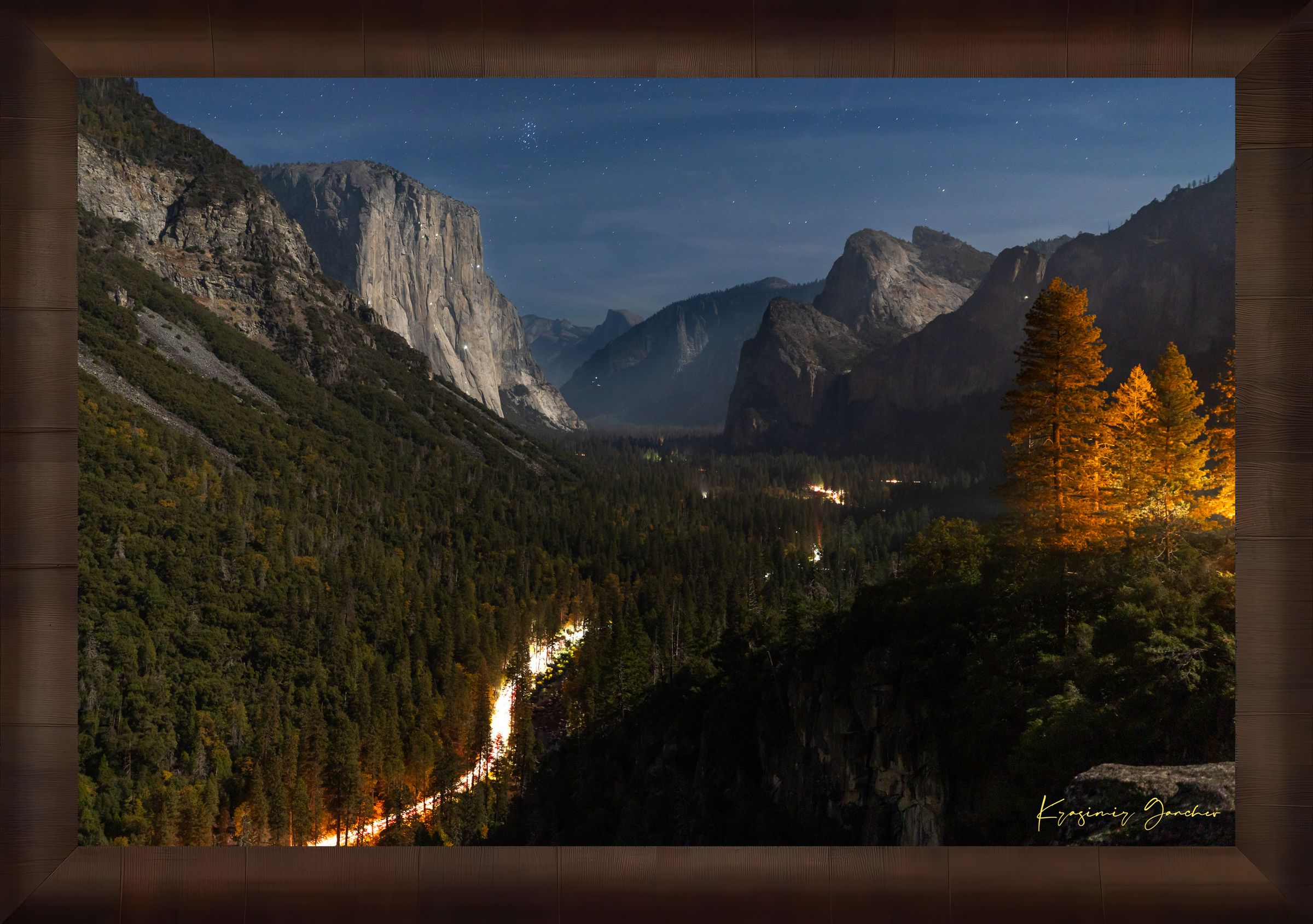 El Capitan at night in Yosemite Valley, moonlight revealing climbing gear and waterfall with clouds above, serene wilderness scene. #Finish_Roma Cigar Leaf Frame