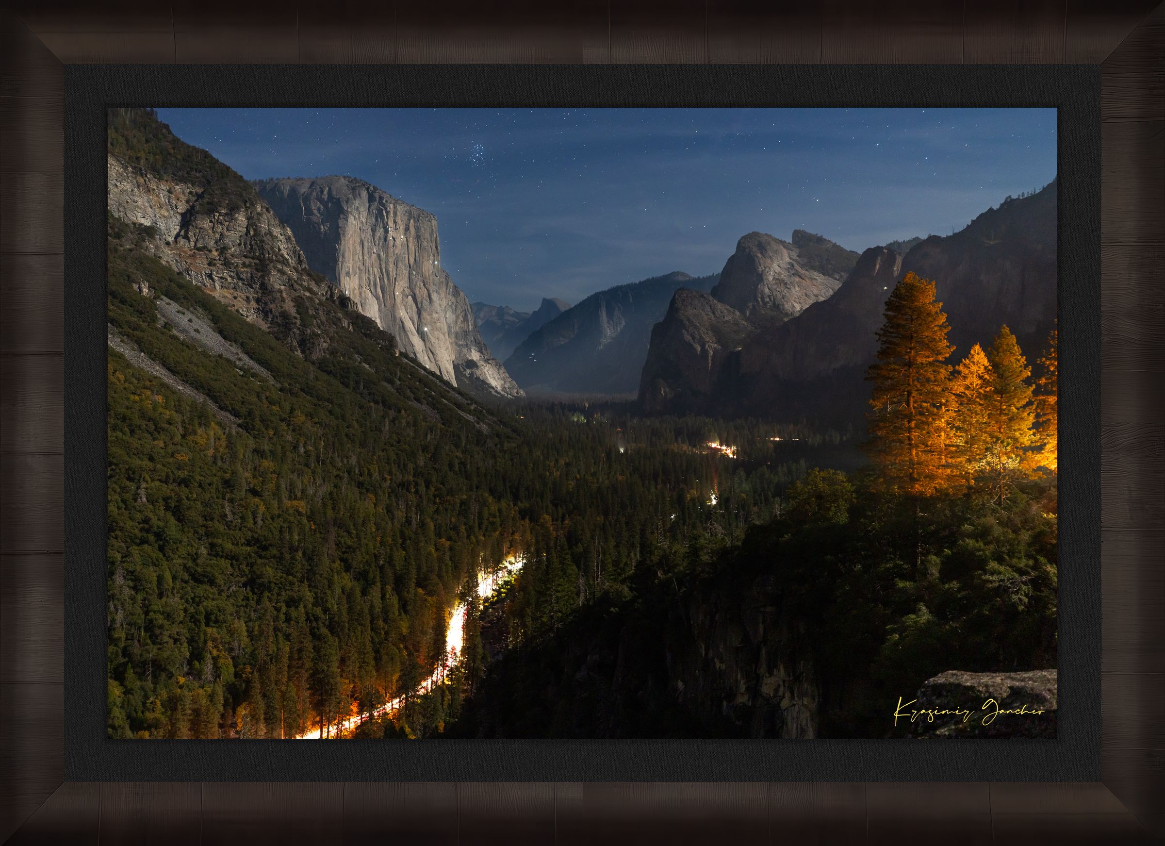 El Capitan at night in Yosemite Valley, moonlight revealing climbing gear and waterfall with clouds above, serene wilderness scene. #Finish_Roma Dark Ash Frame & Dark Liner