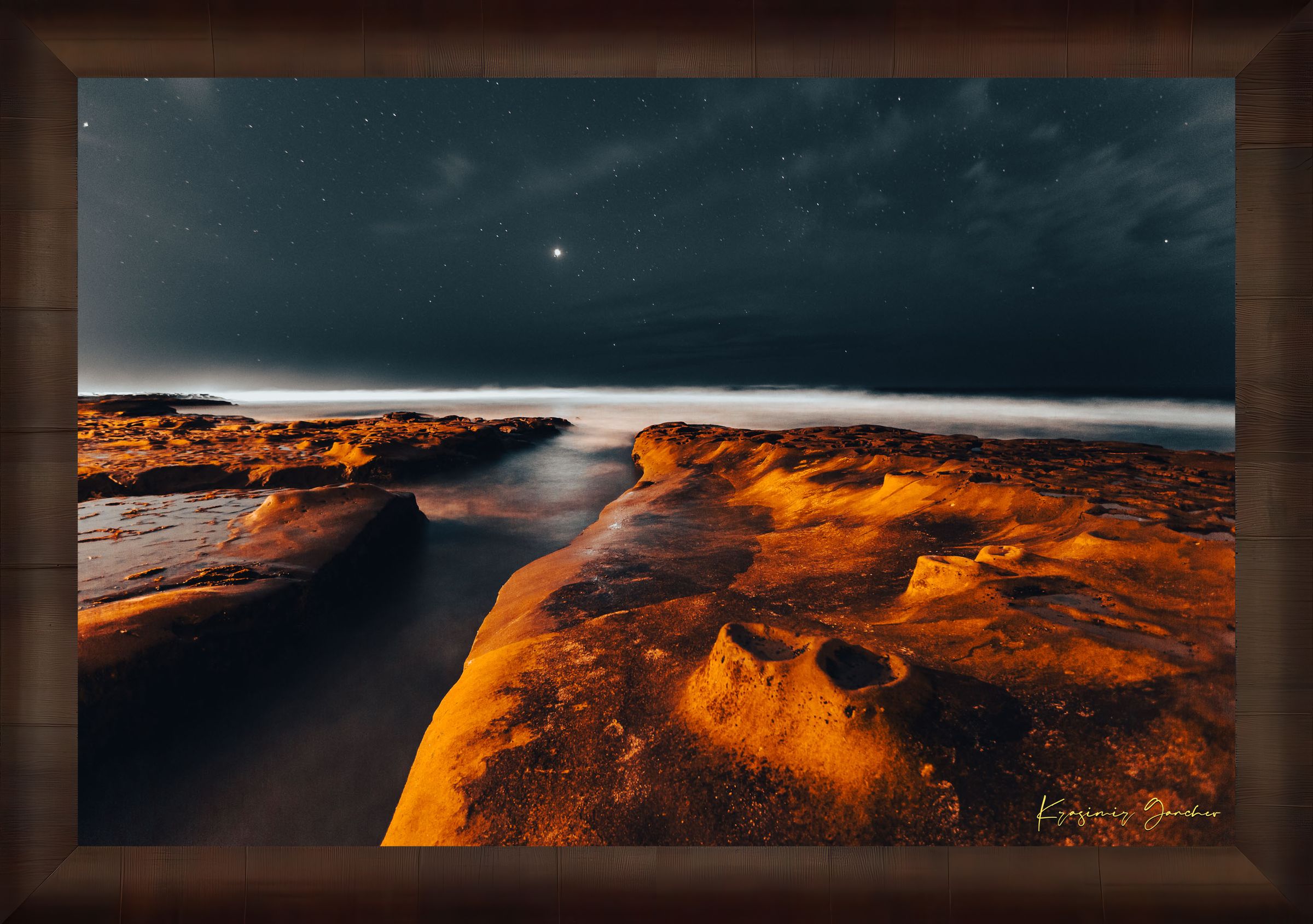 Nighttime La Jolla coastal scene showing tide pools under a starry sky with reflective ocean surface mirroring the stars. #Finish_Roma Cigar Leaf Frame