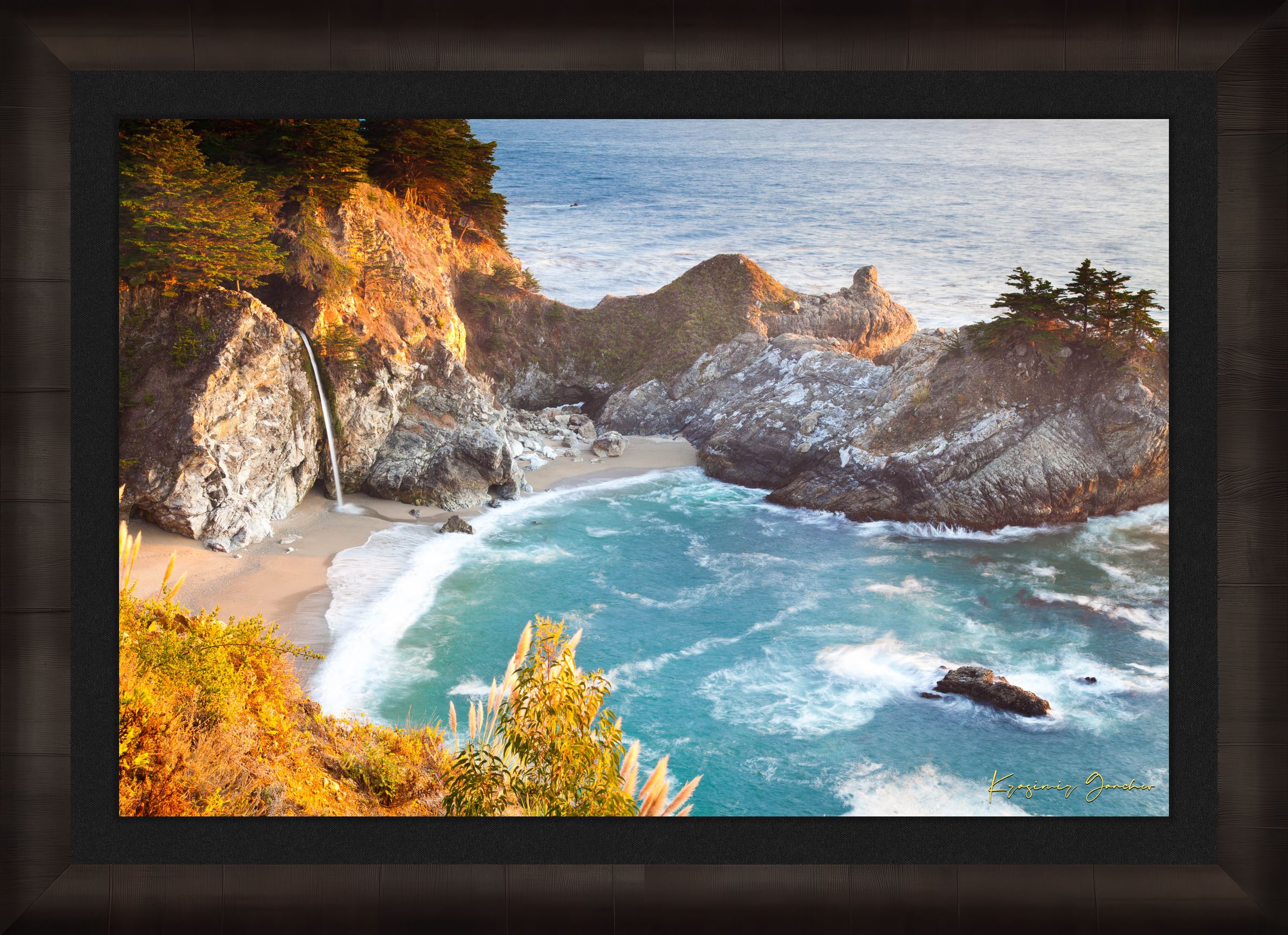Waterfall cascading onto beach at McWay Falls, Big Sur, captured in golden sunset light. #Finish_Roma Dark Ash Frame & Dark Liner
