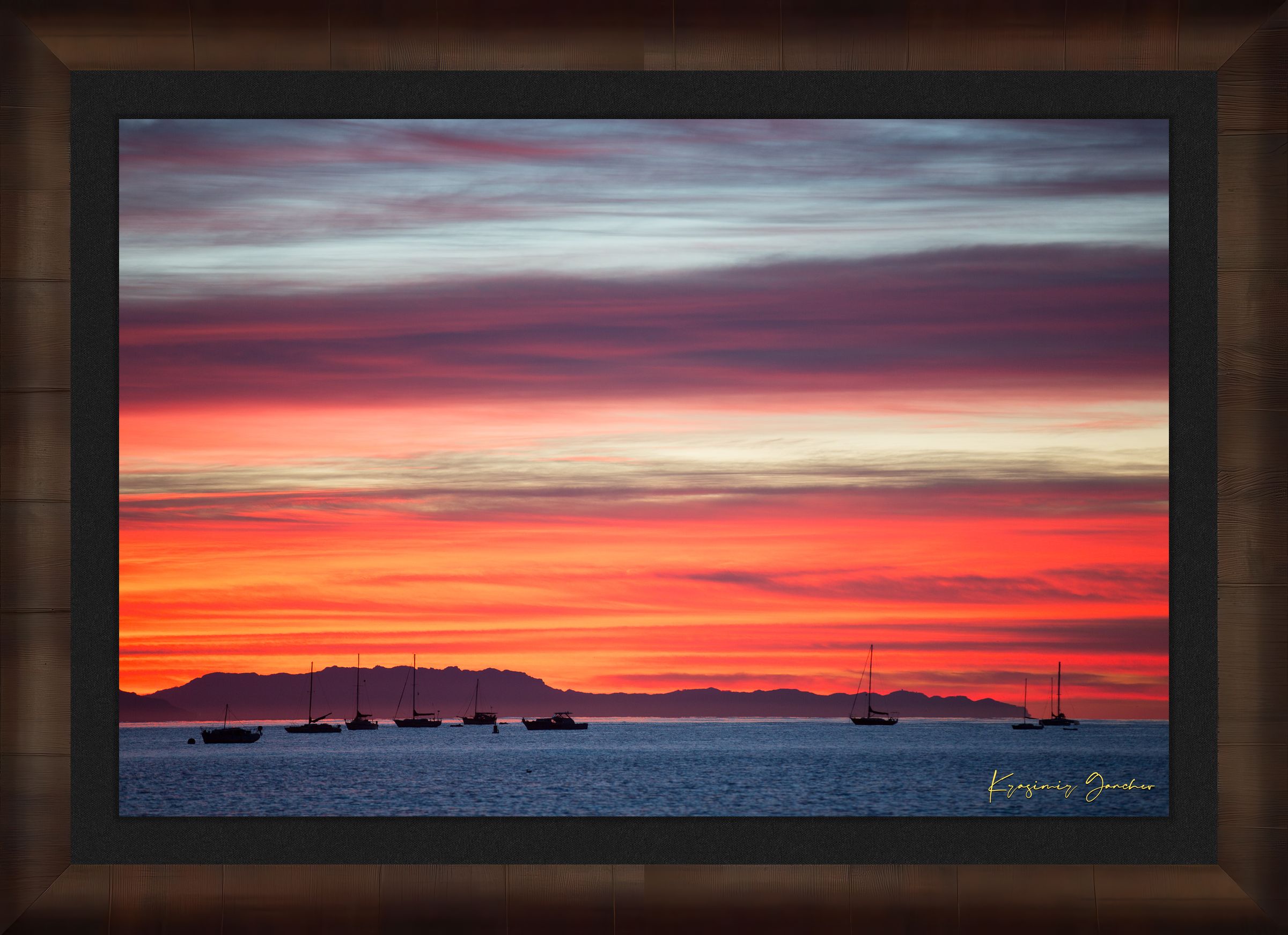 East Beach along the coastal landscape of Santa Barbara, California, during sunset with boats silhouetted on the horizon. #Finish_Roma Cigar Leaf Frame & Dark Liner