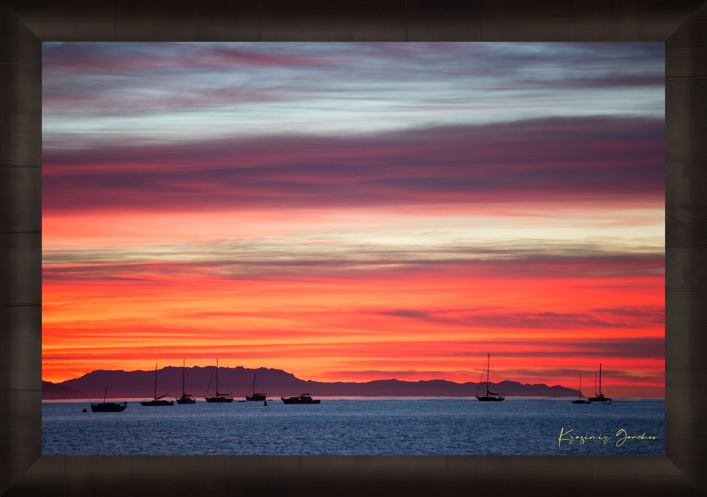East Beach along the coastal landscape of Santa Barbara, California, during sunset with boats silhouetted on the horizon. #Finish_Roma Dark Ash Frame
