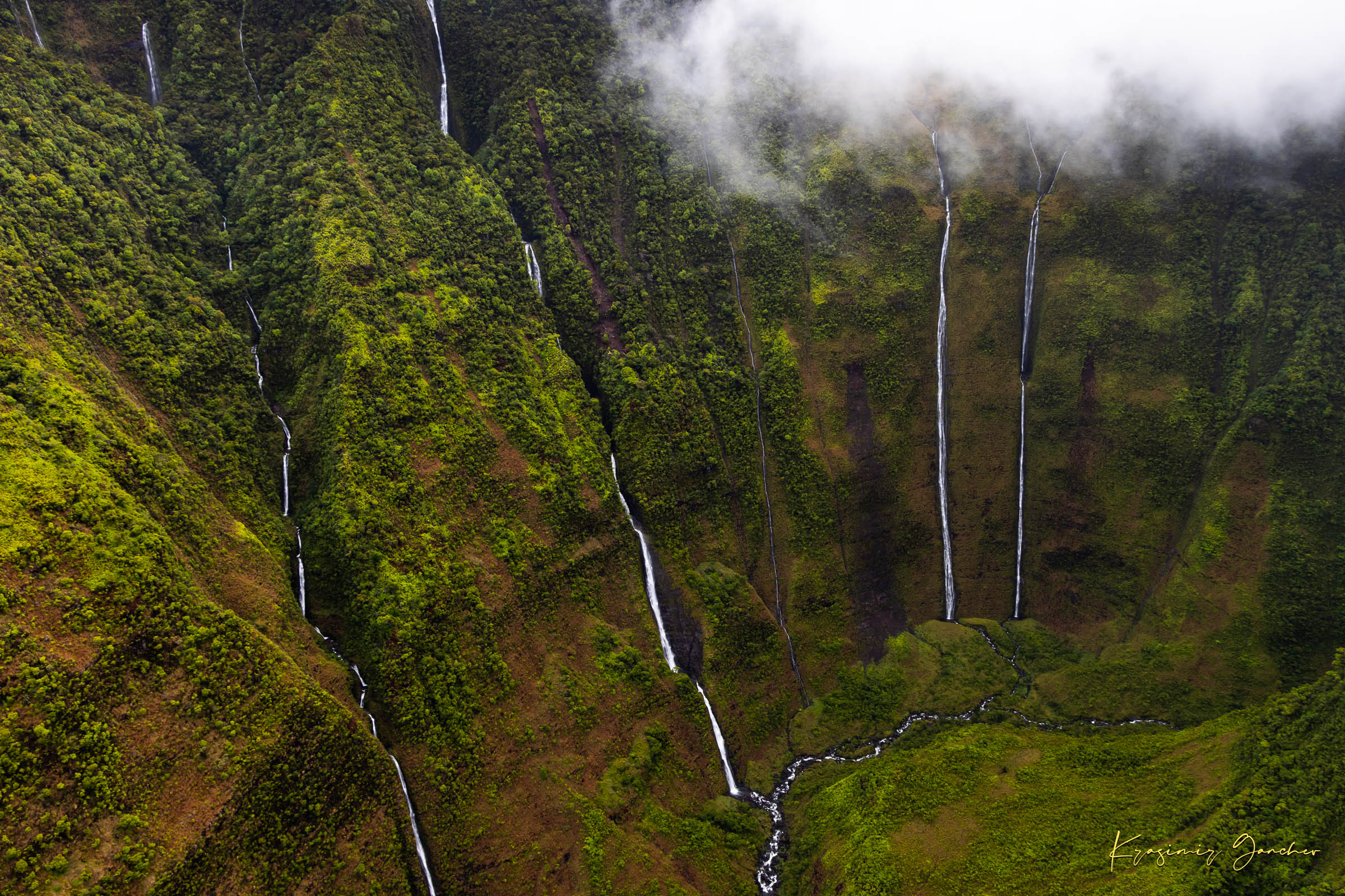 Waterfall cascading down a cliff in the Weeping Wall region, Kauai, under daytime light and cloud cover. #Finish_Acrylic Recess