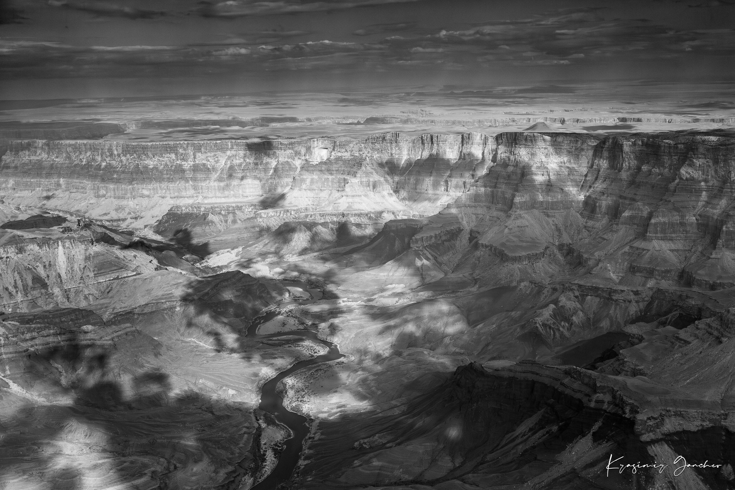 Grand Canyon National Park with Colorado River flowing through canyon and desert terrain under daylight conditions. #Finish_Acrylic Recess