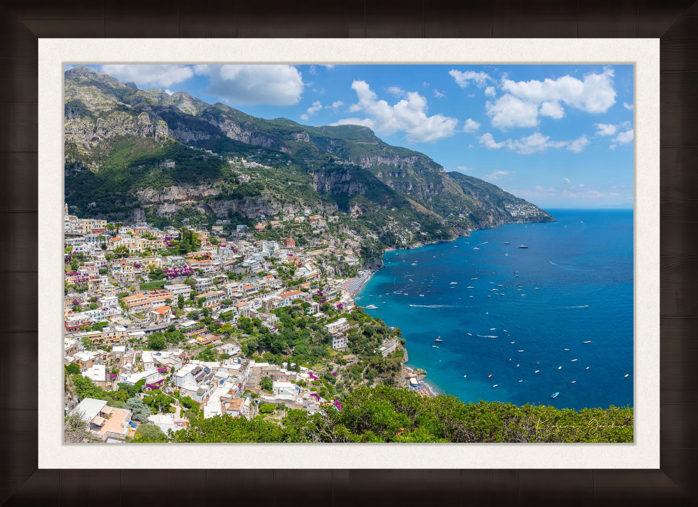 Coastal town of Portofino, Italy, overlooking the Mediterranean Sea with lush green mountains and clear blue sky. #Finish_Roma Dark Ash Frame & Bright Liner