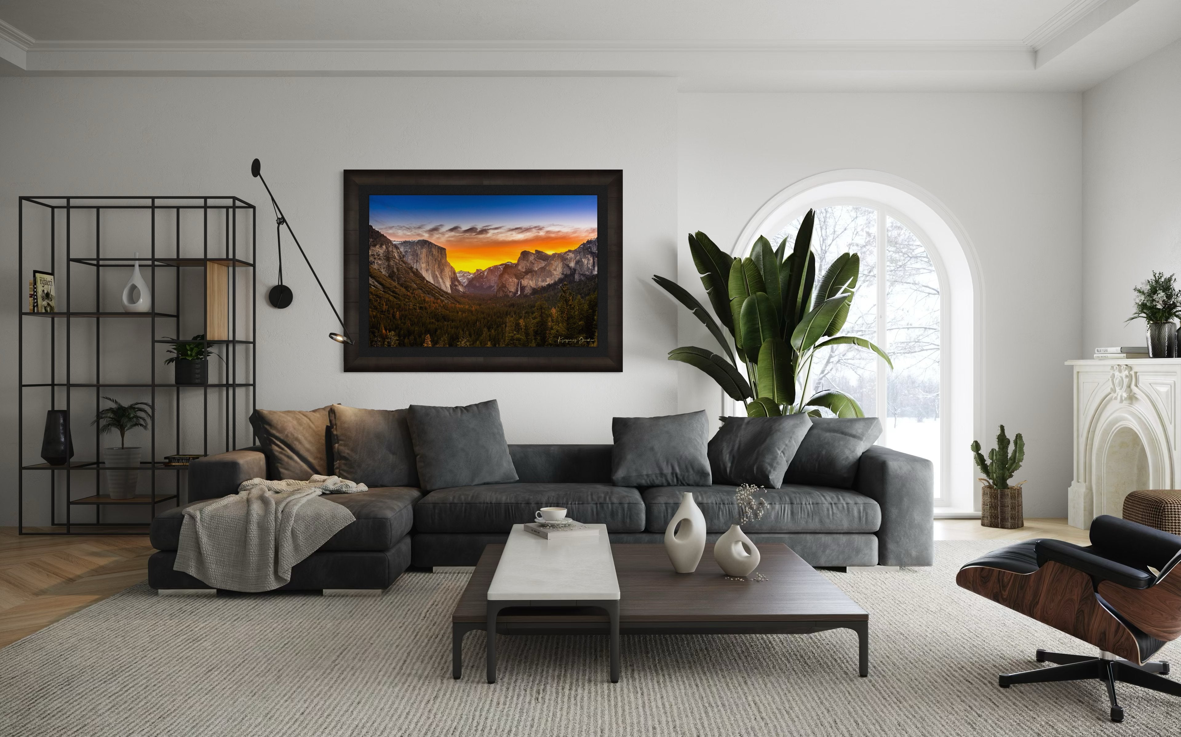 El Capitan rising above Yosemite Valley at sunrise, sunlit peaks framed by layered clouds. #Finish_Roma Dark Ash Frame & Dark Liner