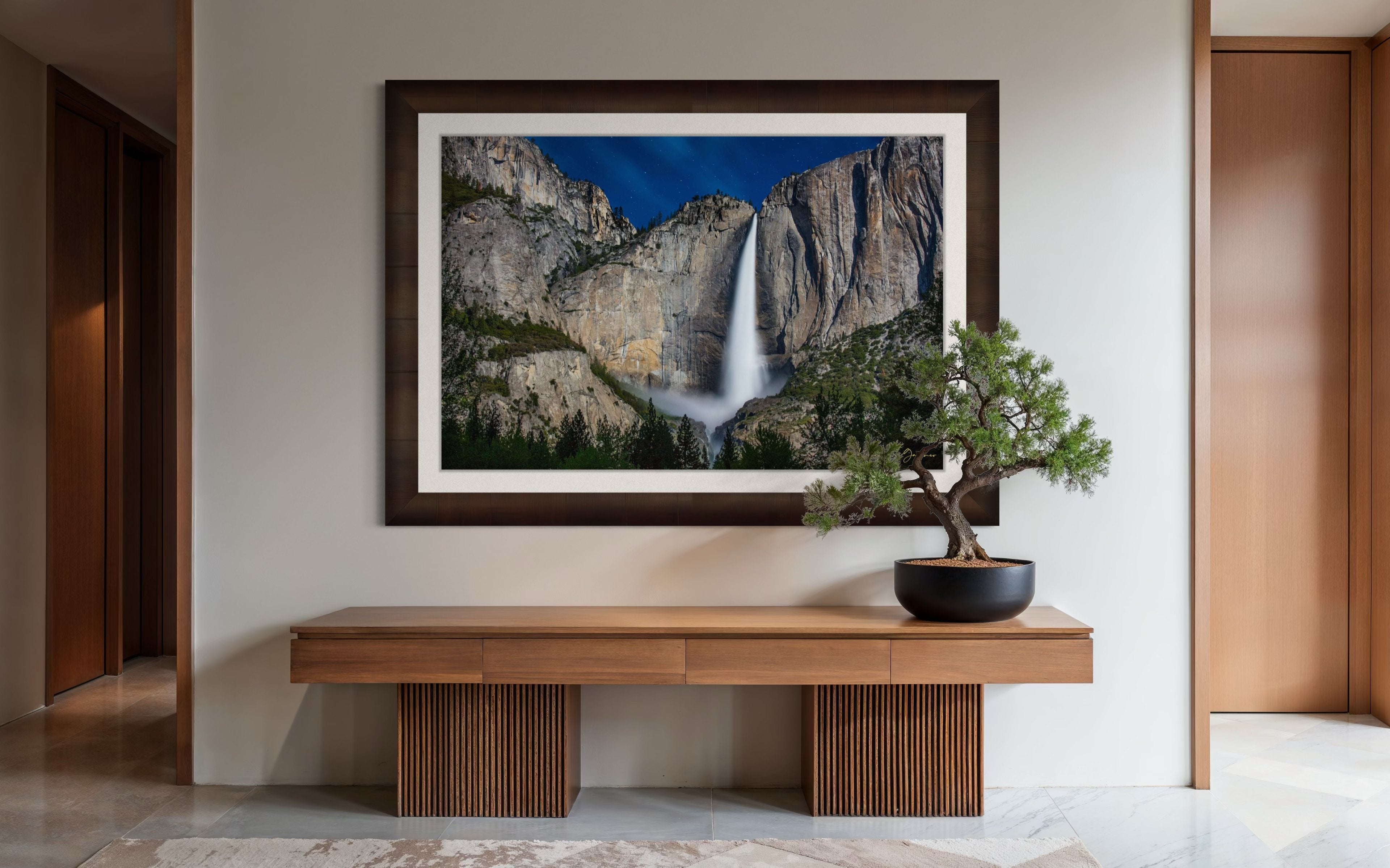 Upper Yosemite Falls illuminated by moonlight against a dark mountainous backdrop at night with cloud cover. #Finish_Roma Cigar Leaf Frame & Bright Liner