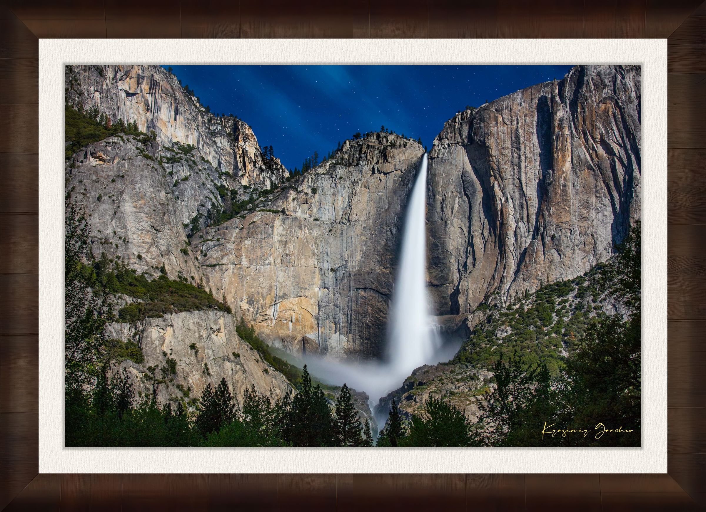 Upper Yosemite Falls illuminated by moonlight against a dark mountainous backdrop at night with cloud cover. #Finish_Roma Cigar Leaf Frame & Bright Liner