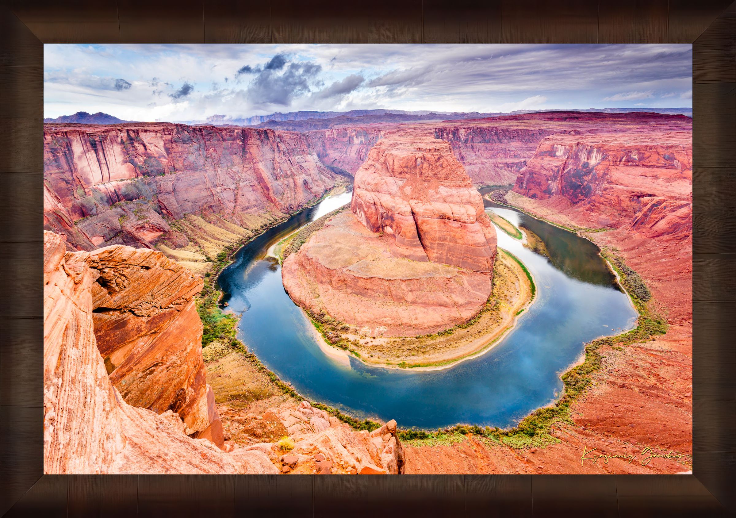 Colorado River curves through Horseshoe Bend at dawn. Water reflects sunlight and surrounding red rock cliffs under cloudy skies. #Finish_Roma Cigar Leaf Frame