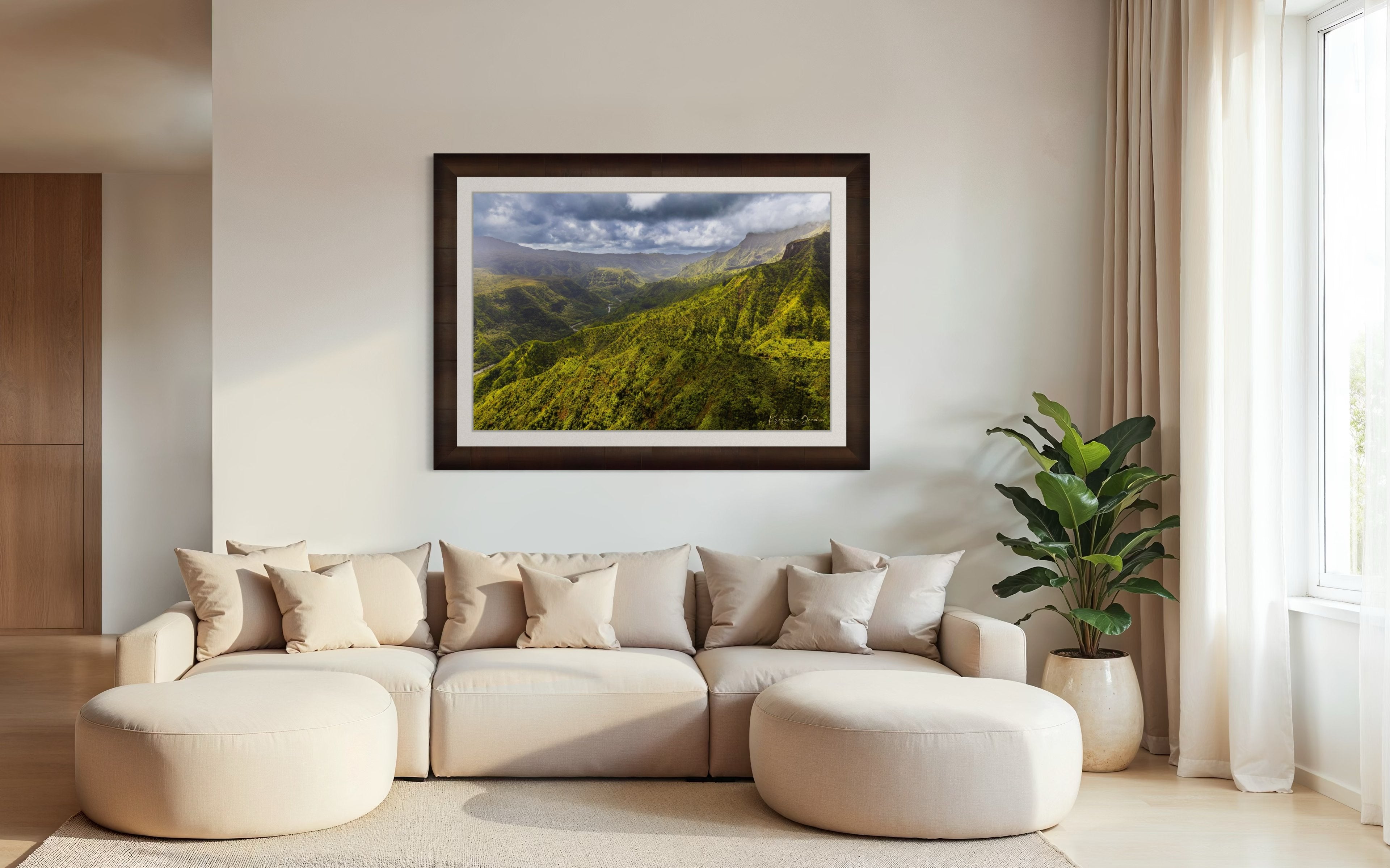 Expansive aerial view of a mountainous valley in Kauai illuminated by daylight, covered in low-lying cloud. #Finish_Roma Cigar Leaf Frame & Bright Liner