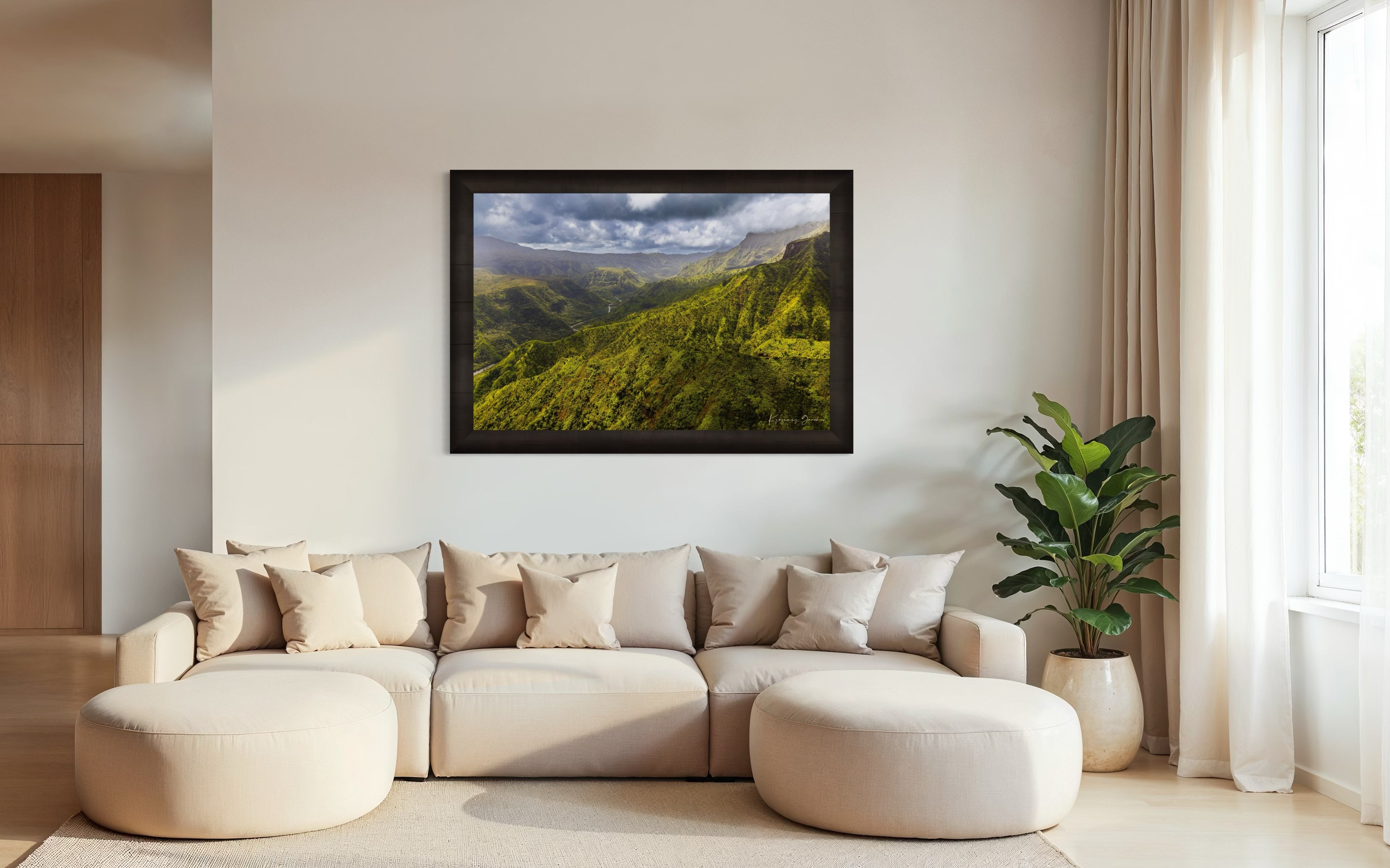 Expansive aerial view of a mountainous valley in Kauai illuminated by daylight, covered in low-lying cloud. #Finish_Roma Dark Ash Frame