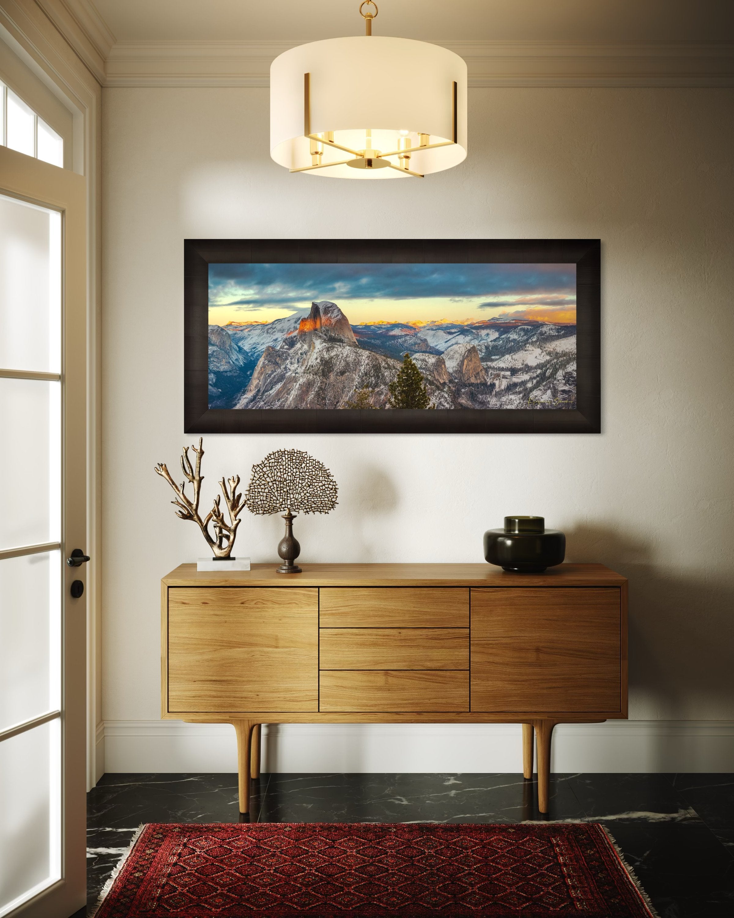 Sunset view of Half Dome monolith with dynamic shadows and sunlight over snow-dusted peaks and clouds in Yosemite National Park. #Finish_Roma Dark Ash Frame