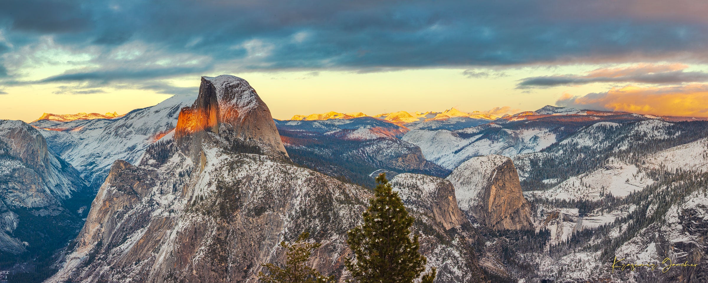 Sunset view of Half Dome monolith with dynamic shadows and sunlight over snow-dusted peaks and clouds in Yosemite National Park. #Finish_Acrylic Recess