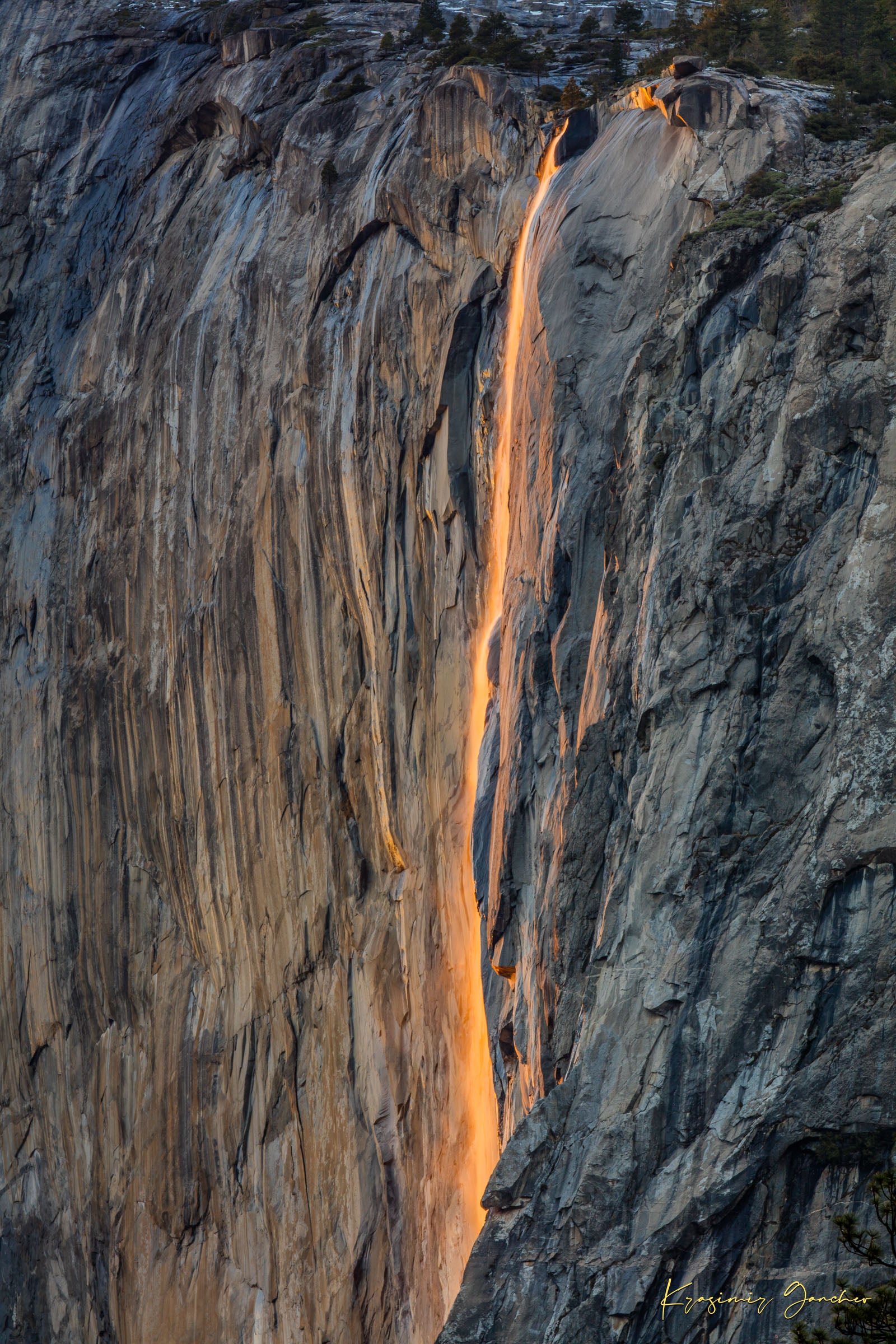 Detailed view of the firefall effect on El Capitan monolith with glowing sunlight refracting through mist from Horsetail Fall in Yosemite. #Finish_Acrylic Recess