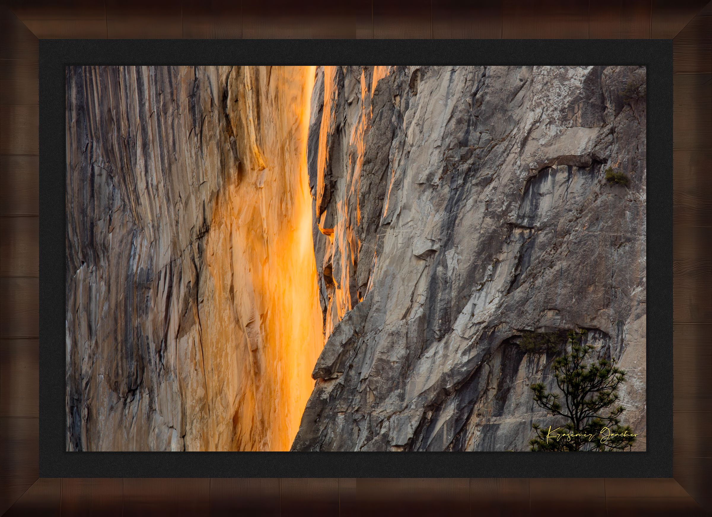 Firefall phenomenon on El Capitan monolith as sunlight reflects off Horsetail Fall mist during sunset in Yosemite National Park. #Finish_Roma Cigar Leaf Frame & Dark Liner