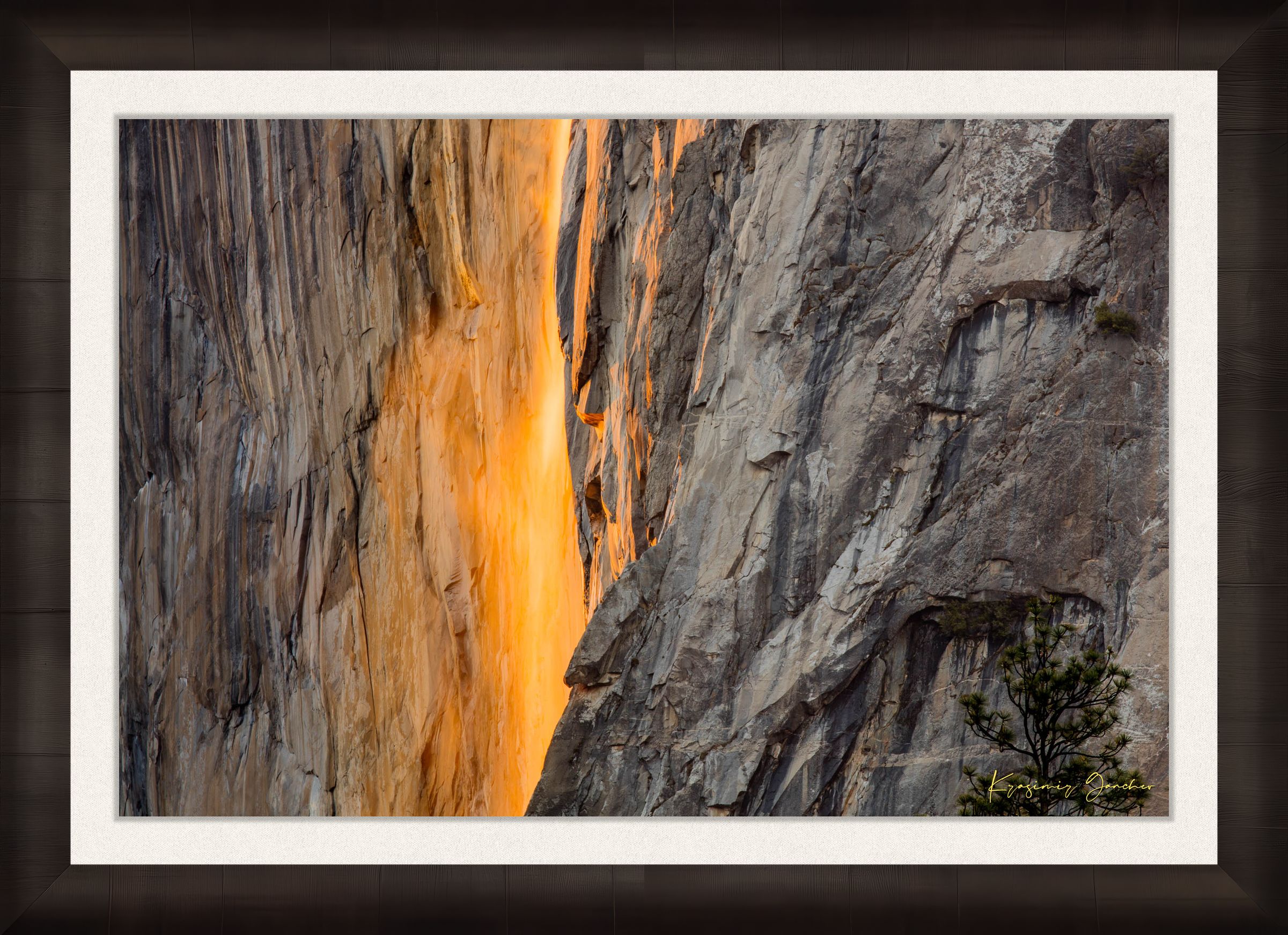 Firefall phenomenon on El Capitan monolith as sunlight reflects off Horsetail Fall mist during sunset in Yosemite National Park. #Finish_Roma Dark Ash Frame & Bright Liner