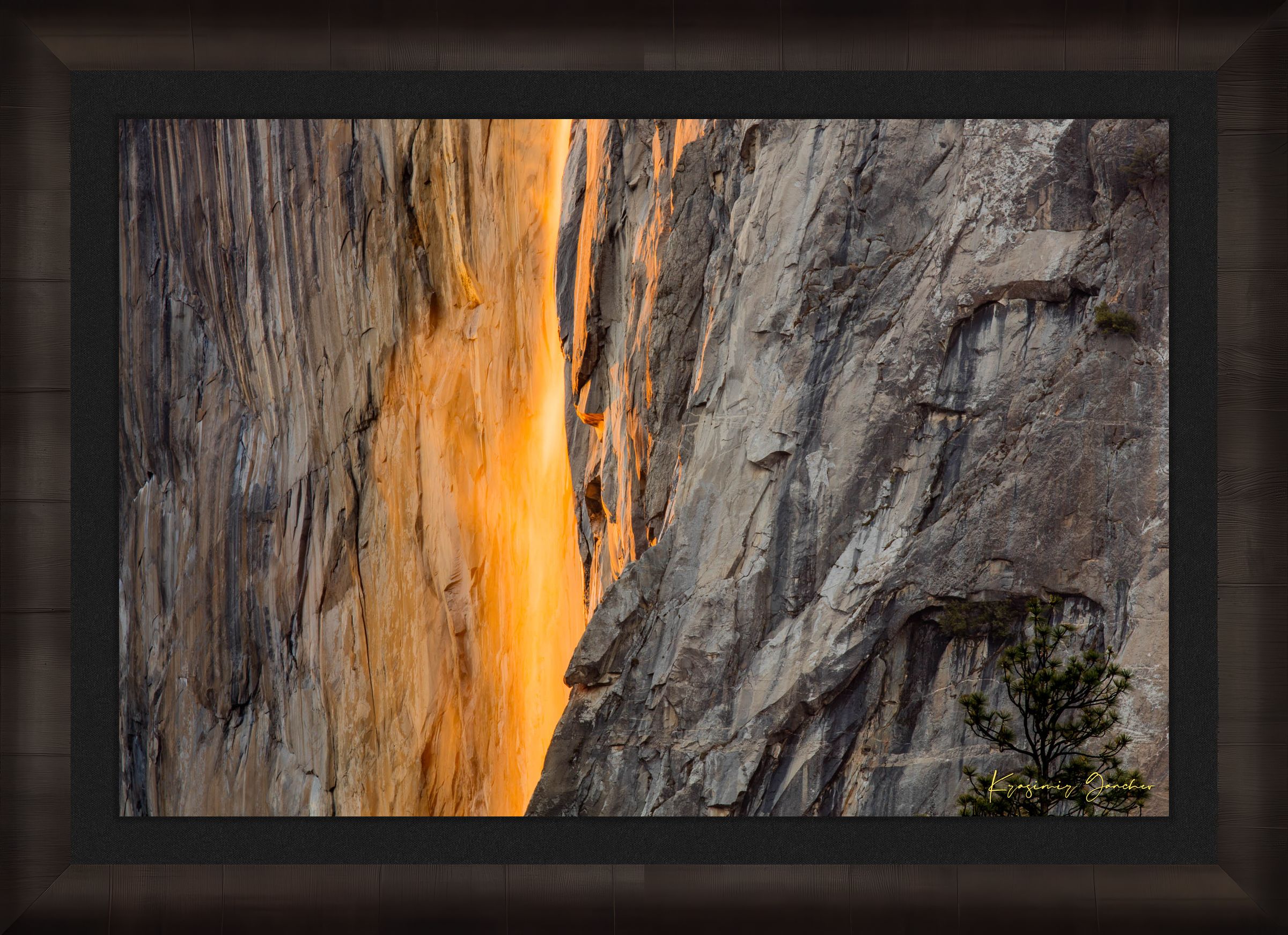Firefall phenomenon on El Capitan monolith as sunlight reflects off Horsetail Fall mist during sunset in Yosemite National Park. #Finish_Roma Dark Ash Frame & Dark Liner