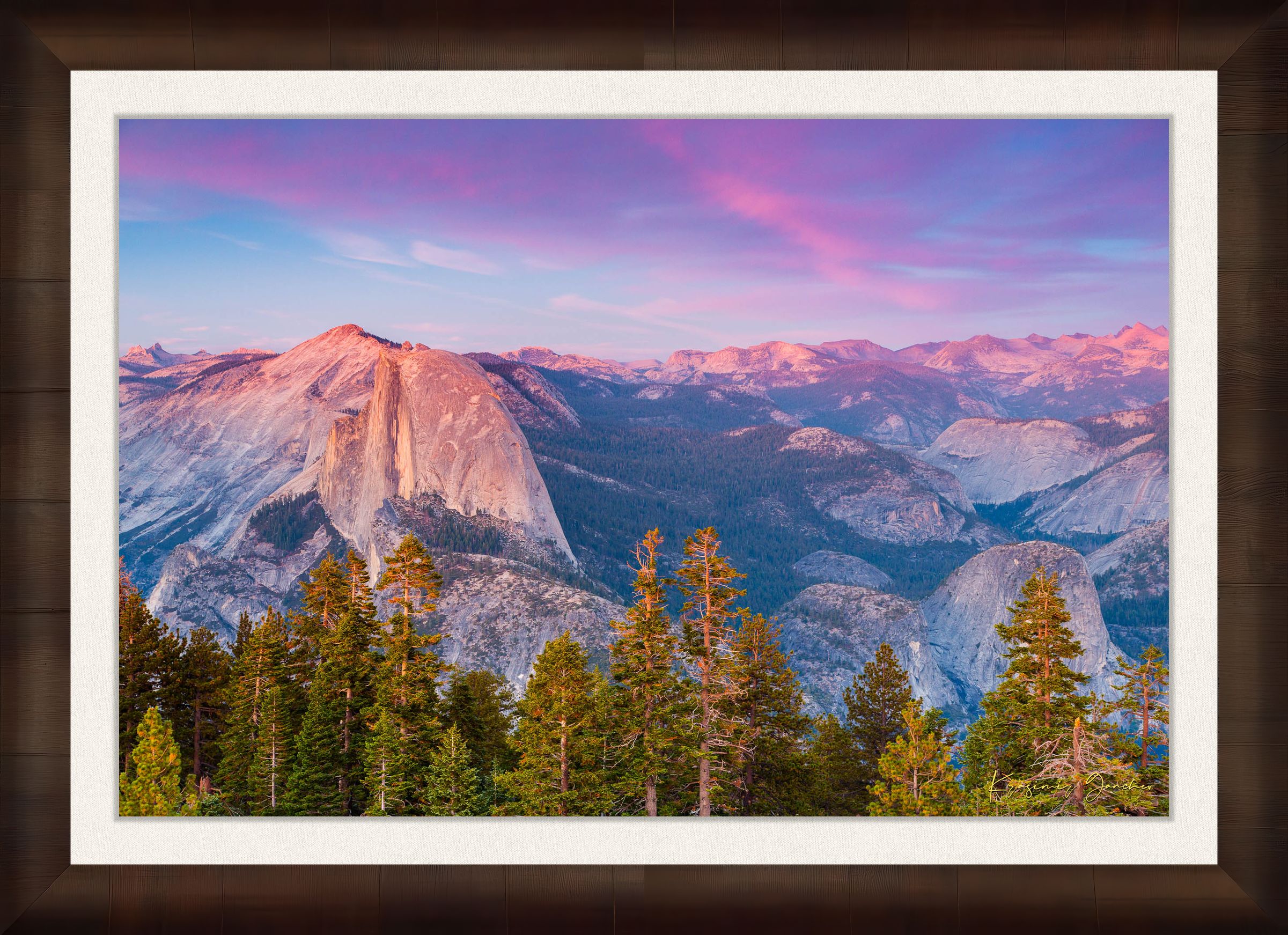 Granite monolith of Half Dome silhouetted against colorful sunset skies over Yosemite National Park with cloud layers. #Finish_Roma Cigar Leaf Frame & Bright Liner