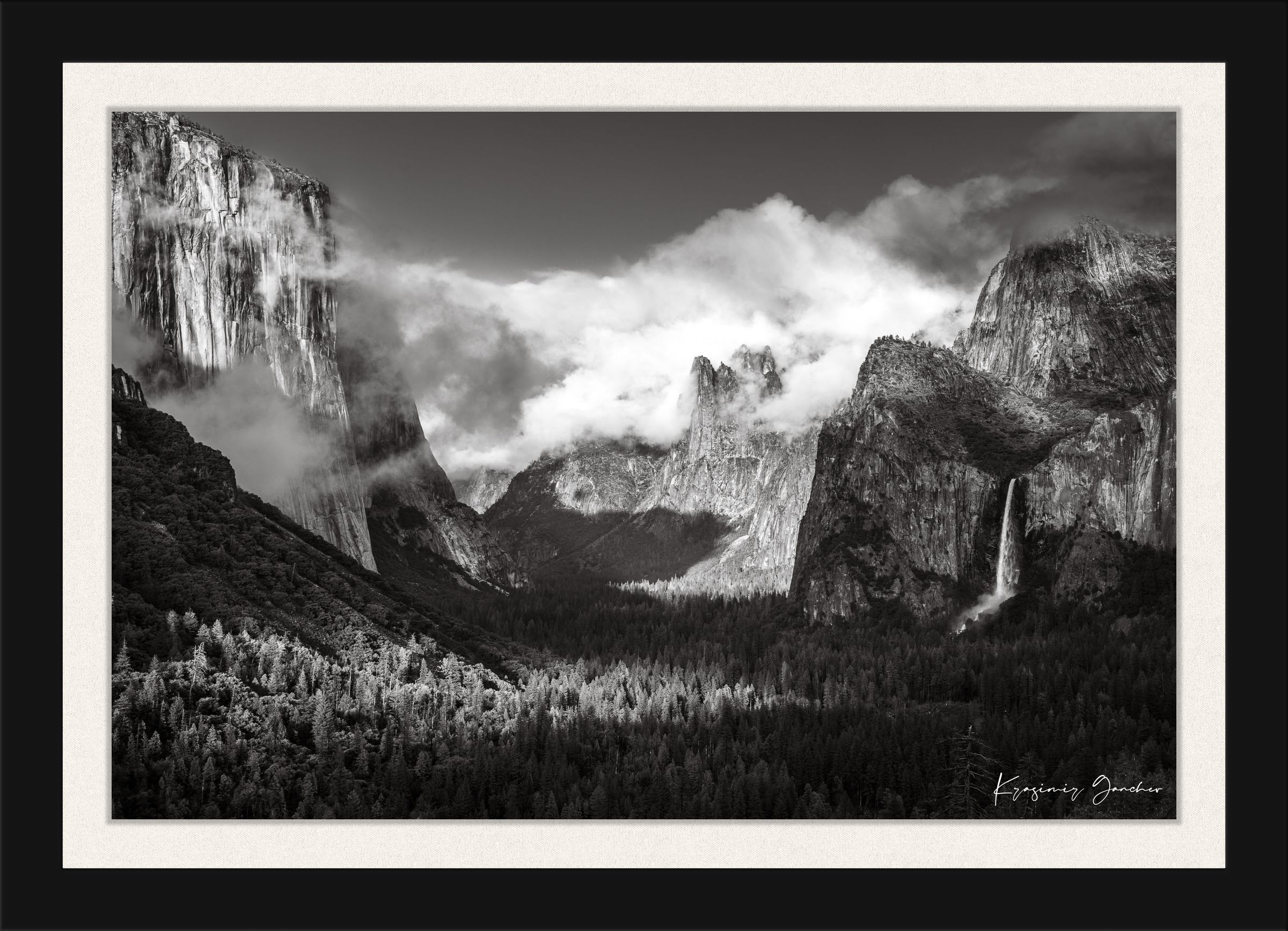 El Capitan granite monolith in Yosemite National Park during daylight, waterfalls cascading down cliffs, clouds above. #Finish_Roma Satin Black Frame & Bright Liner