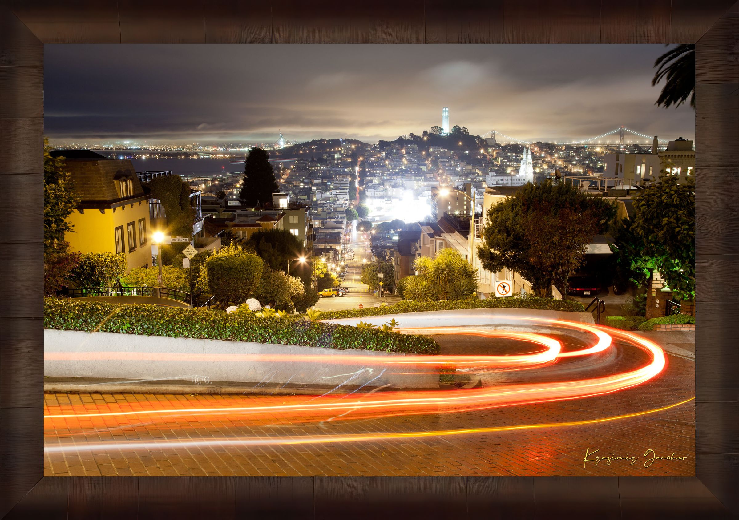 Nighttime Lombard Street in San Francisco showing long exposure light trails under cloudy skies. #Finish_Roma Cigar Leaf Frame