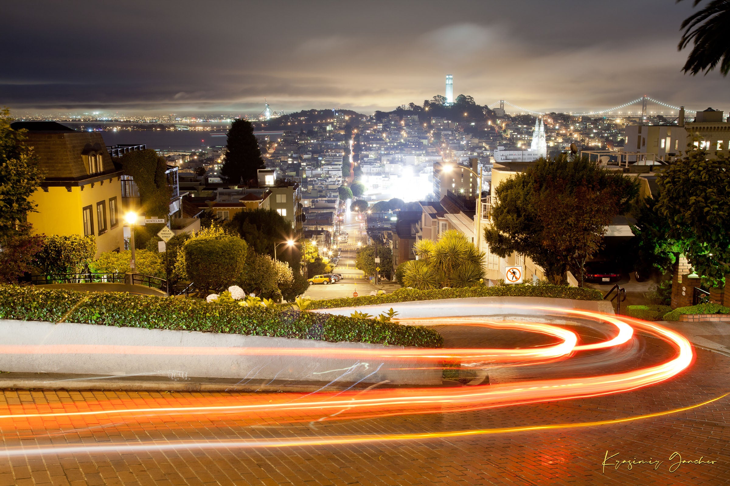 Nighttime Lombard Street in San Francisco showing long exposure light trails under cloudy skies. #Finish_Acrylic Recess