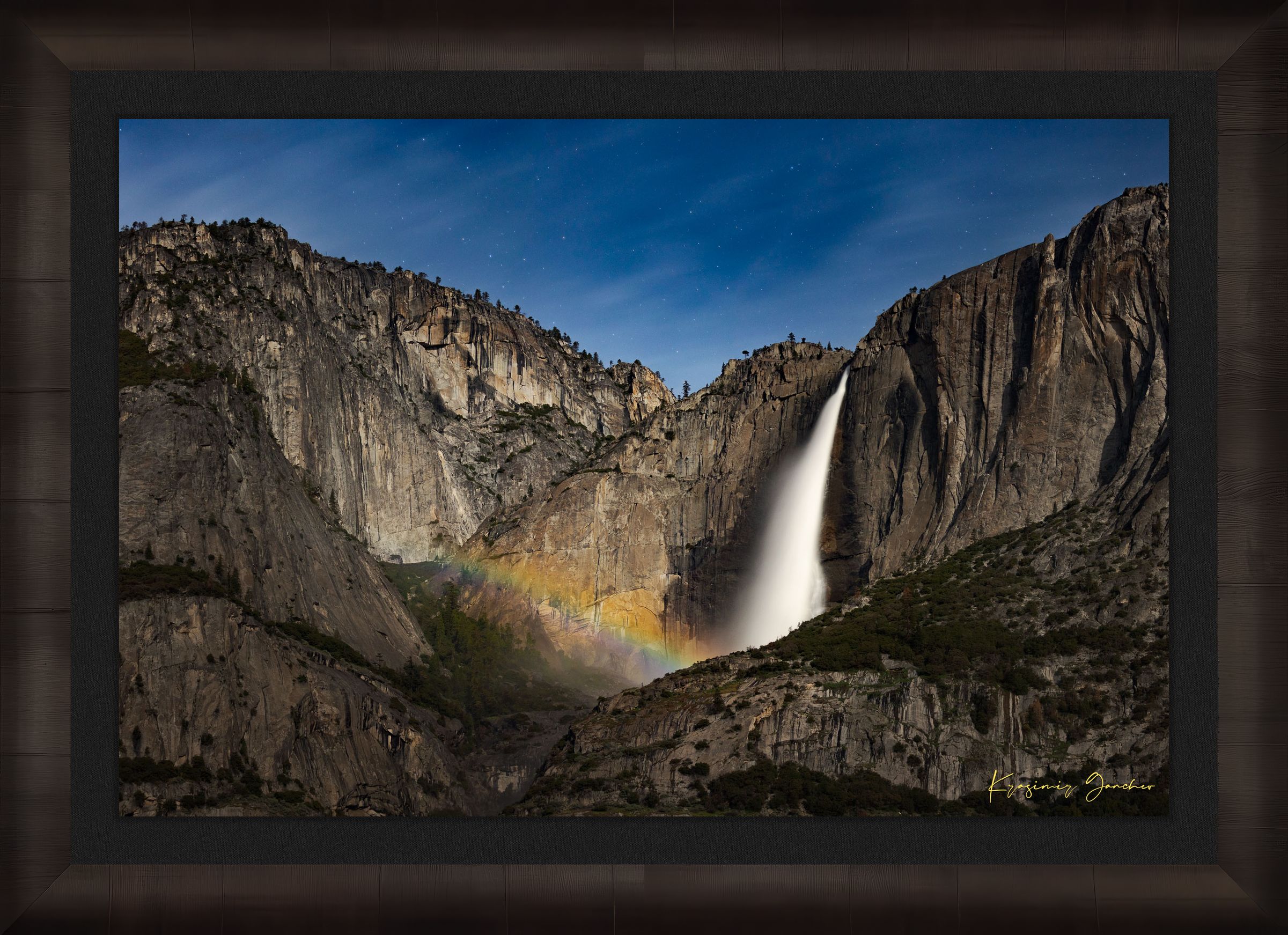 Yosemite Falls at night beneath starlight and a full moon bow, clouds above the monolith. #Finish_Roma Dark Ash Frame & Dark Liner
