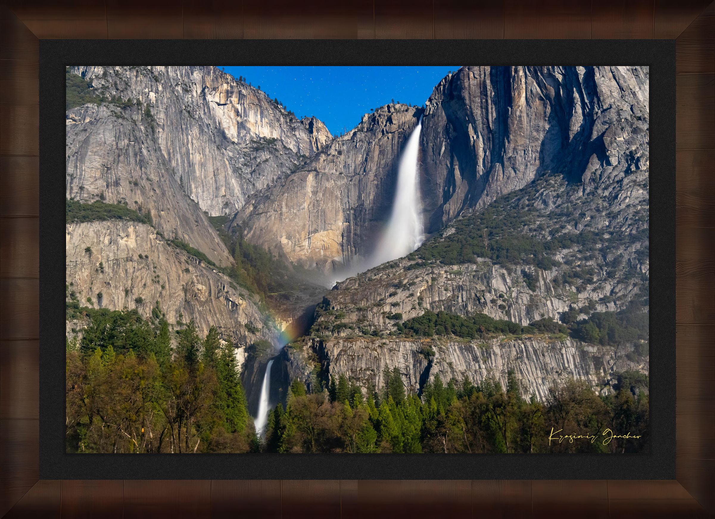 Yosemite Falls under starlight with a moonbow forming in mist created by cascading water against granite cliffs. #Finish_Roma Cigar Leaf Frame & Dark Liner