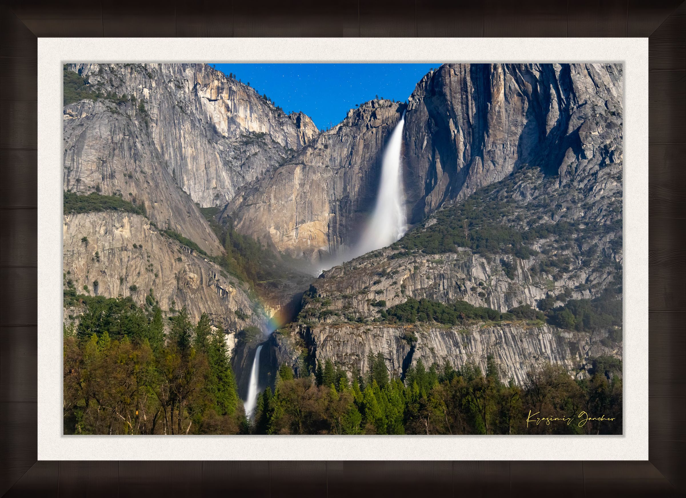 Yosemite Falls under starlight with a moonbow forming in mist created by cascading water against granite cliffs. #Finish_Roma Dark Ash Frame & Bright Liner