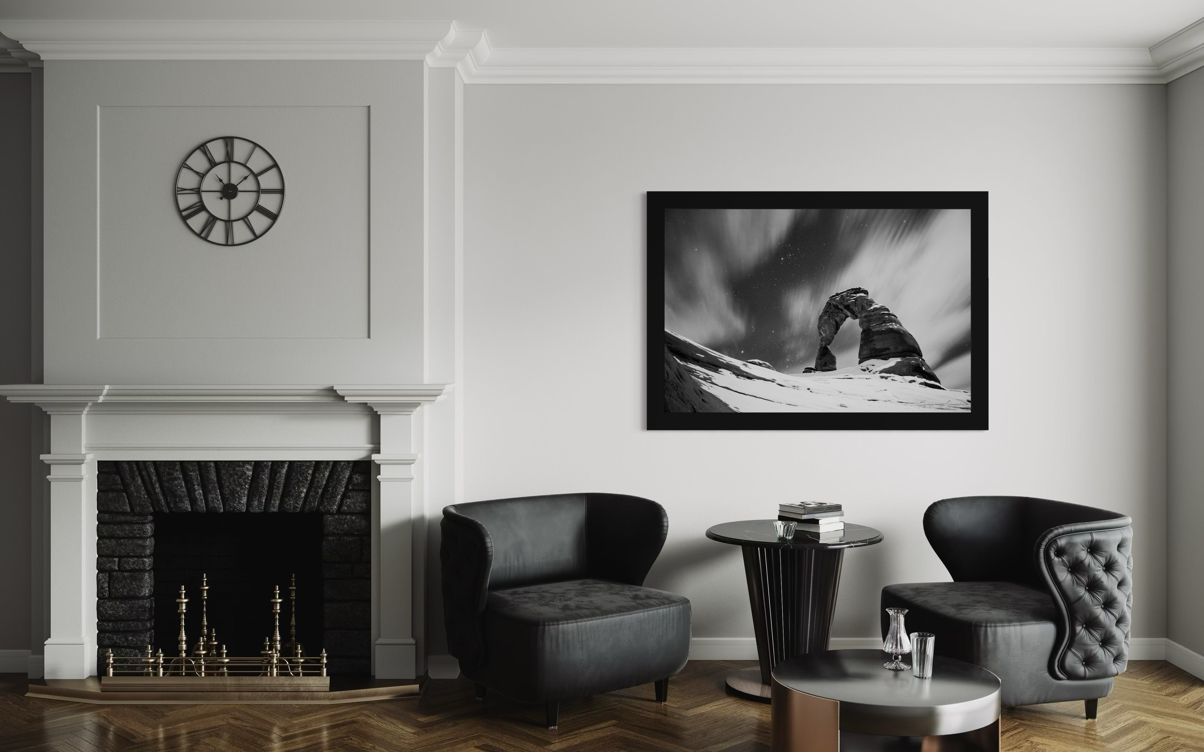 Silhouette of Delicate Arch against a star-filled night sky in Utah's Arches National Park, featuring cloud trails and snow cover. #Finish_Roma Satin Black Frame