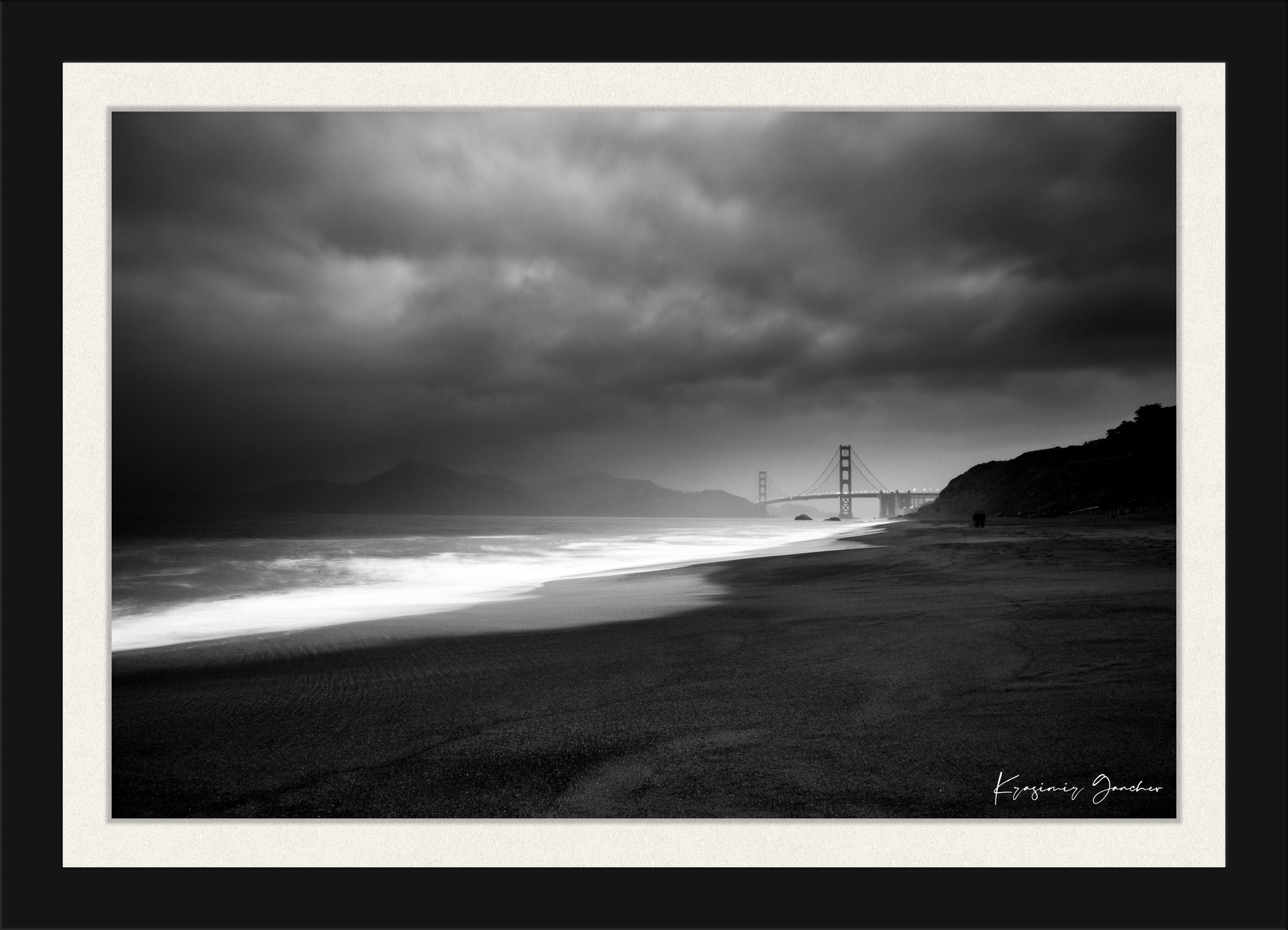 Golden Gate Bridge silhouette visible through thick clouds and fog over ocean near Baker Beach. #Finish_Roma Satin Black Frame & Bright Liner
