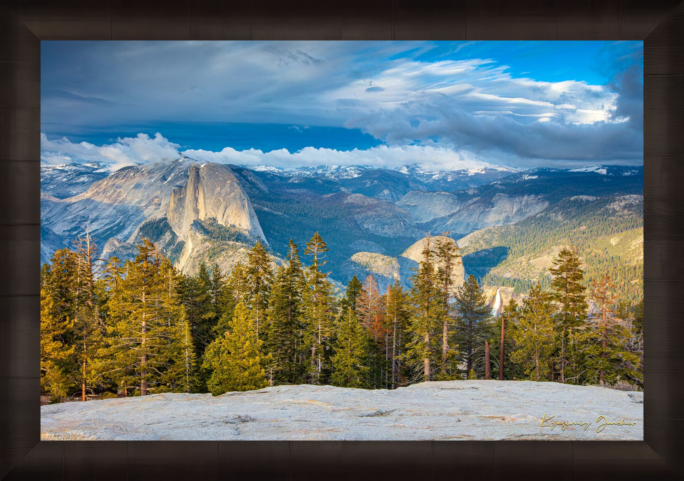 Yosemite Valley panorama beneath moving clouds, featuring monoliths and pine forests in the distance. #Finish_Roma Dark Ash Frame