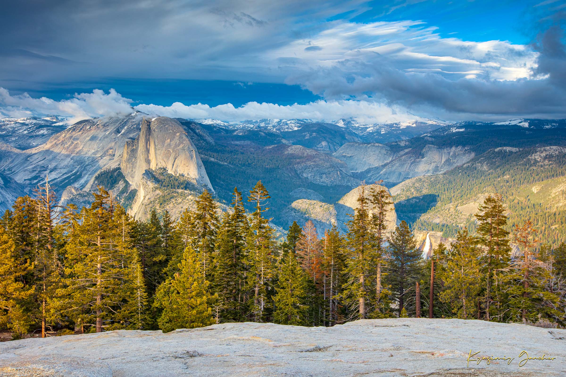 Yosemite Valley panorama beneath moving clouds, featuring monoliths and pine forests in the distance. #Finish_Acrylic Recess