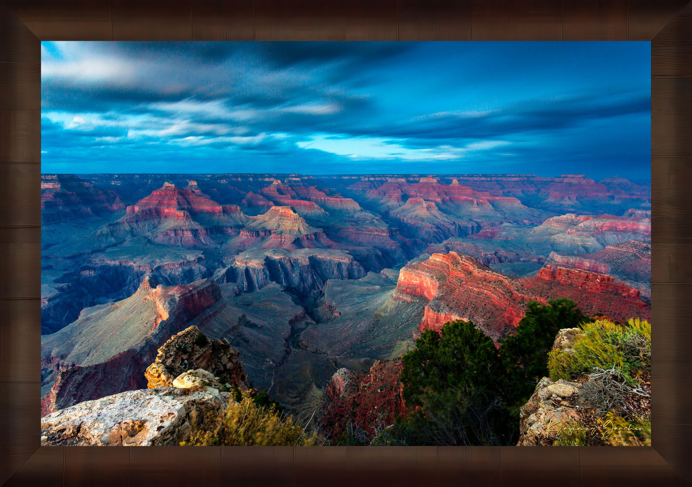 Grand Canyon under a dramatic sky at sunset, storm clouds gathering over the canyon rim during hazy weather. #Finish_Roma Cigar Leaf Frame